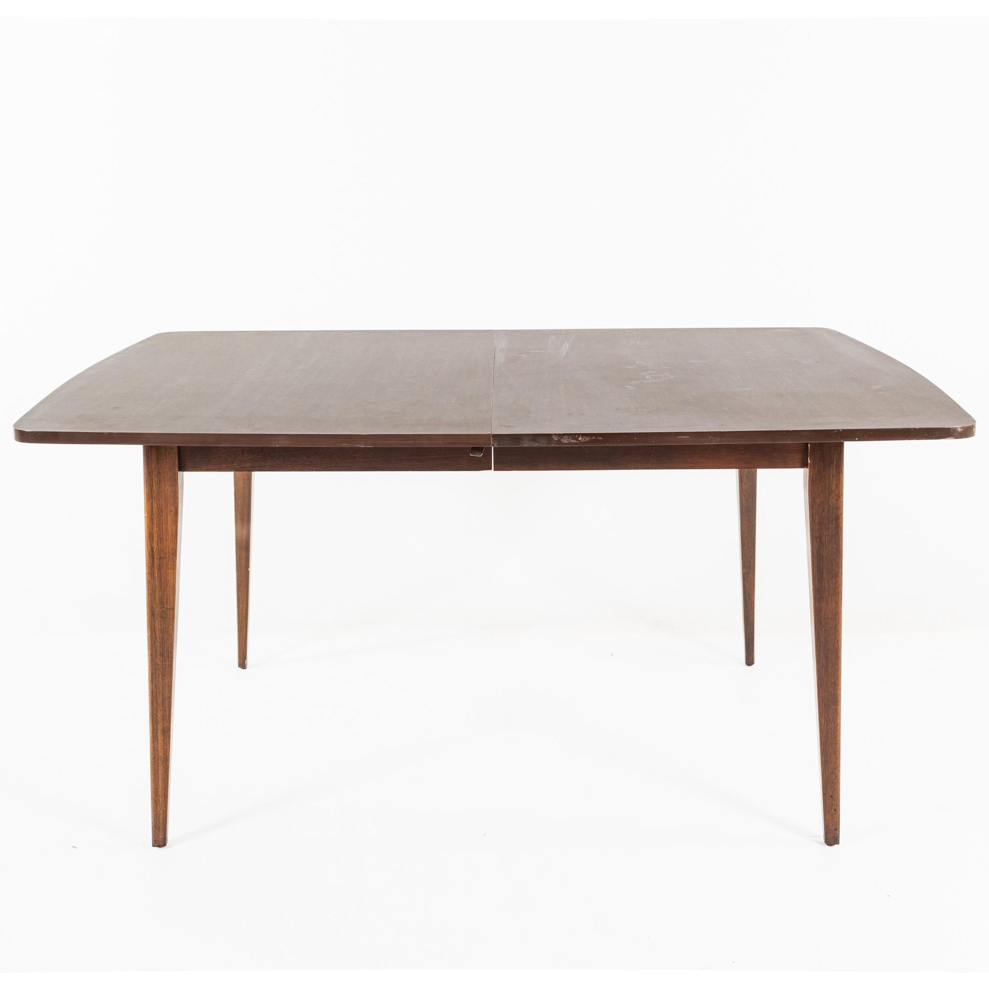 Broyhill style mid century walnut laminate dining table

Table measures: 58 wide x 41 deep x 29 high, with a chair clearance of 25.5 inches

All pieces of furniture can be had in what we call restored vintage condition. That means the piece is
