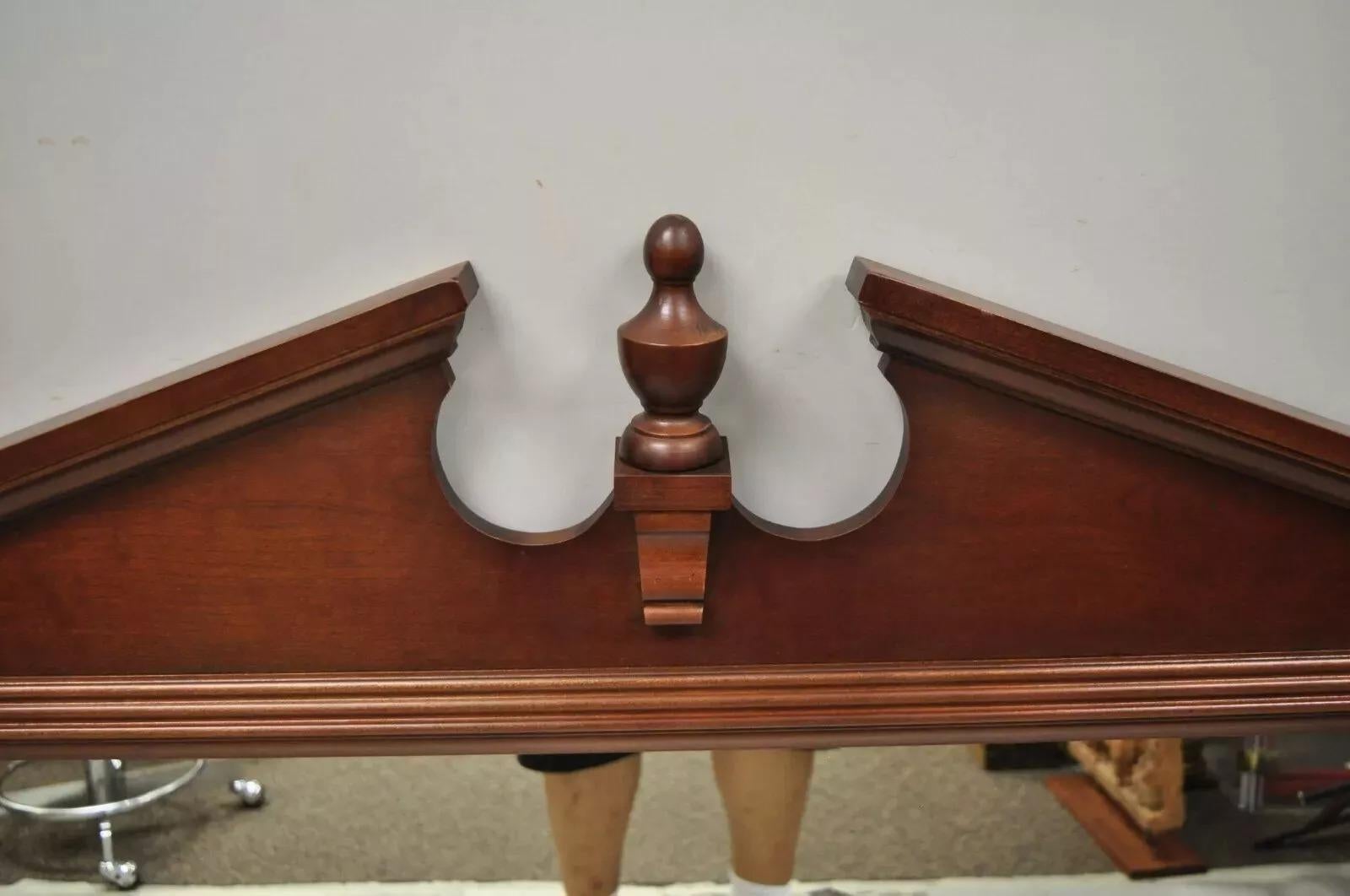 Pre-owned Broyhill Federal Style Broken Arch & Finial Wall Dresser Mirror. Item feature a solid wood frame, beautiful wood grain, nicely carved details, quality American craftsmanship. Circa Late 20th Century. Measurements: 45.75