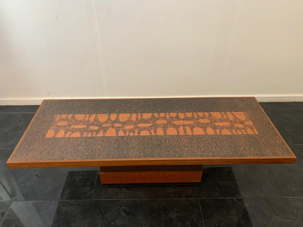 Splendid Brutalist ash wood coffee table with hammered and acid-etched copper plate inserts then masterfully patinated by hand. The design is easily attributable to Heinz Lilienthal.
Packaging with bubble wrap and cardboard boxes is included. If the