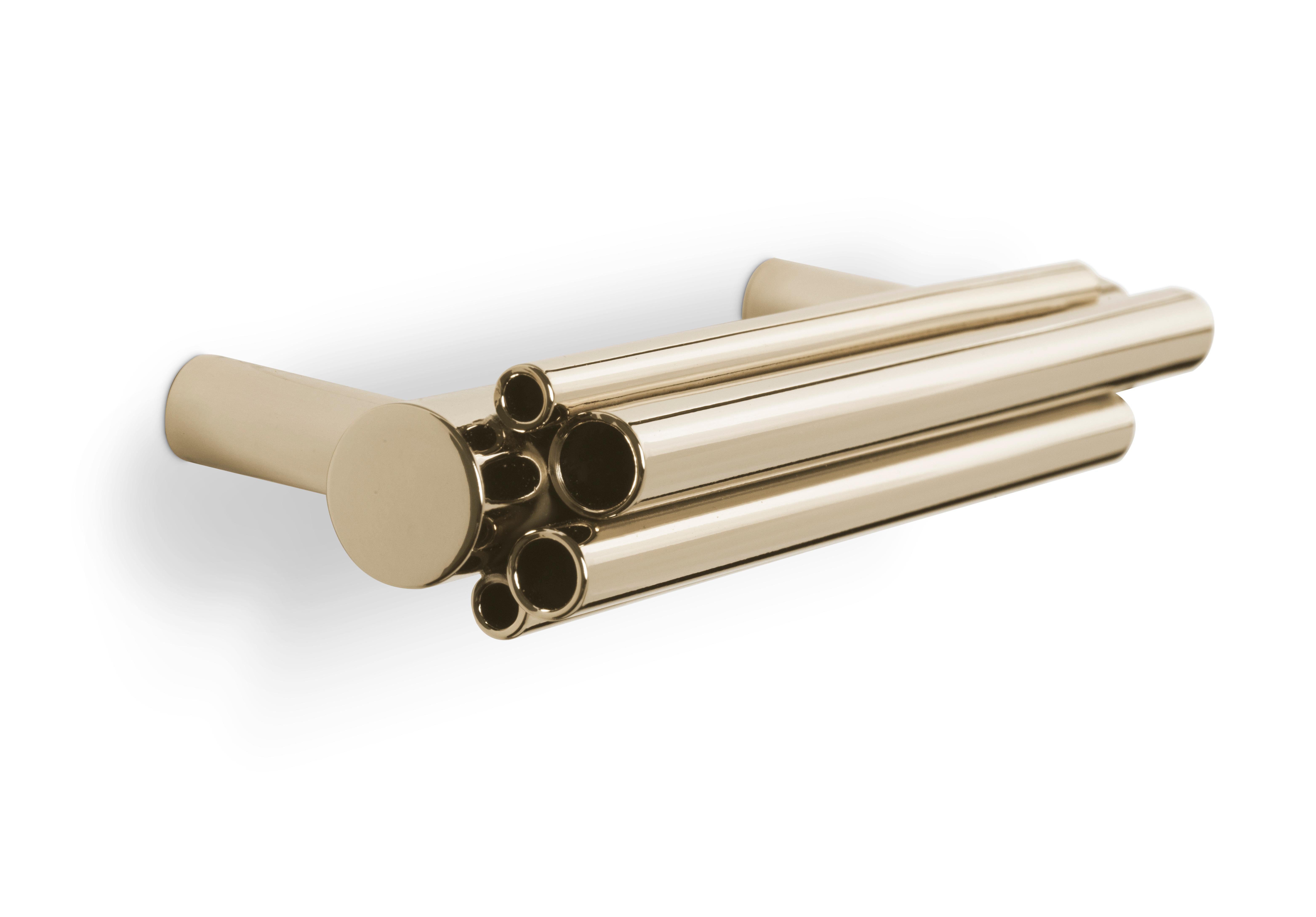 Asymmetrical Gold Plated tubes compose this artistical series of Furniture and Door Handles taking inspiration in Deligthfull's most luxurious lamps. Adorn your designs, doors, cabinetry and furniture with Brubeck pulls.