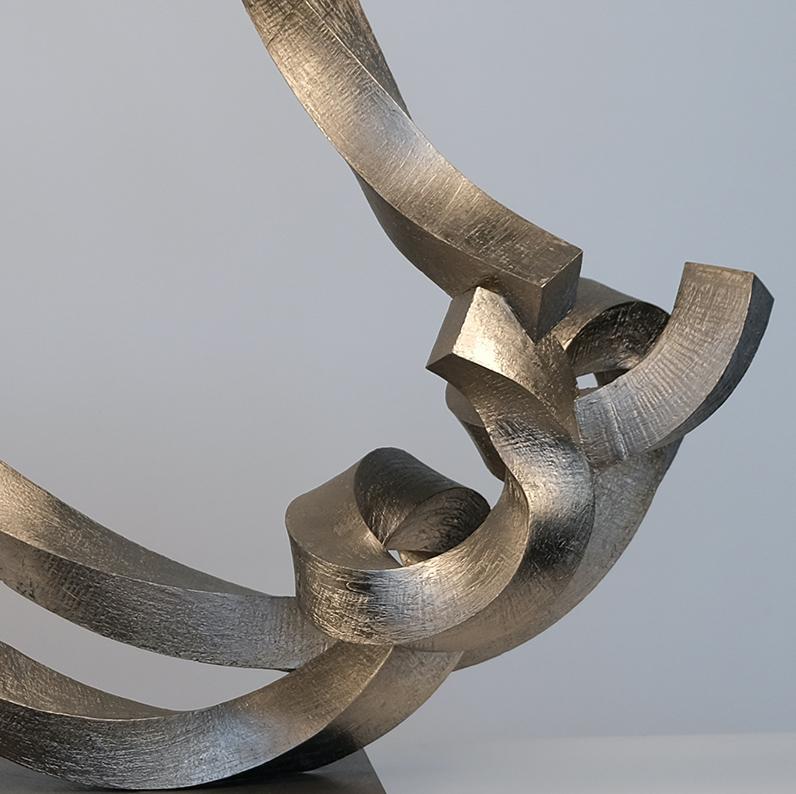 Throughout his career, sculptor Bruce Beasley has experimented with various sculptural media, ranging from cast aluminum to Lucite to bronze to wood. As one of his more recent works, this bronze is inspired by experiments in virtual reality.

The
