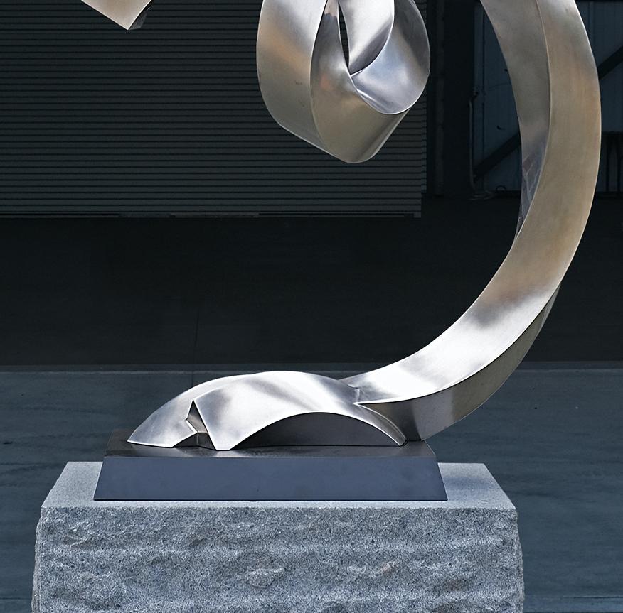 Throughout his career, sculptor Bruce Beasley has worked with various sculptural media, ranging from cast aluminum to Lucite to bronze to wood. As one of his more recent pieces, this stainless steel sculpture is inspired by experiments in virtual