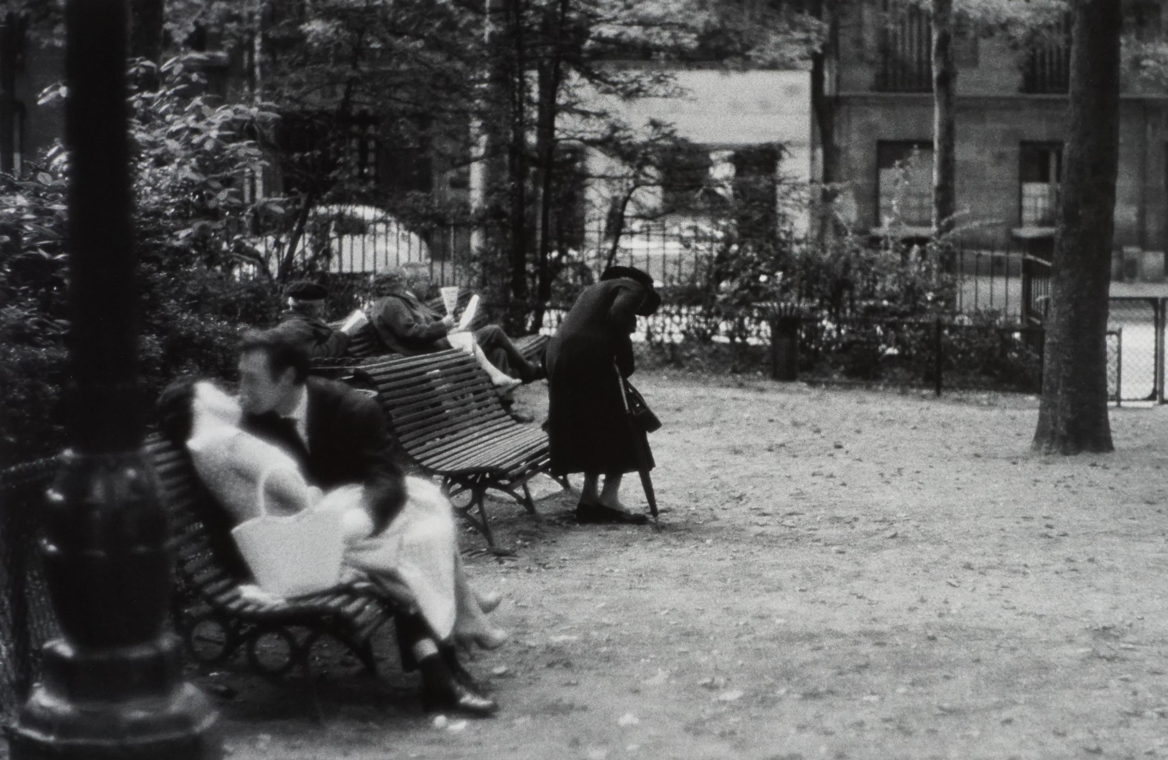 Bruce Davidson Black and White Photograph - The Widow of Montmartre 1956 (Lady and Gentleman on park bench kissing)