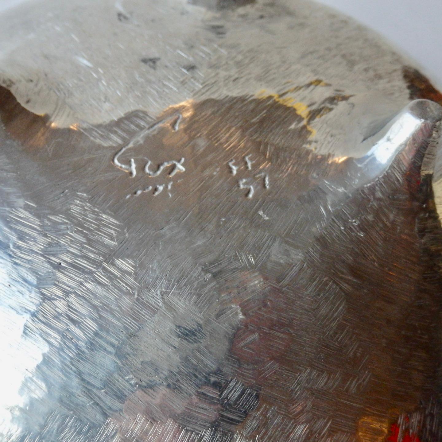 Mid-Century Modern Bruce Fox organic form polished cast aluminum footed bowl . 