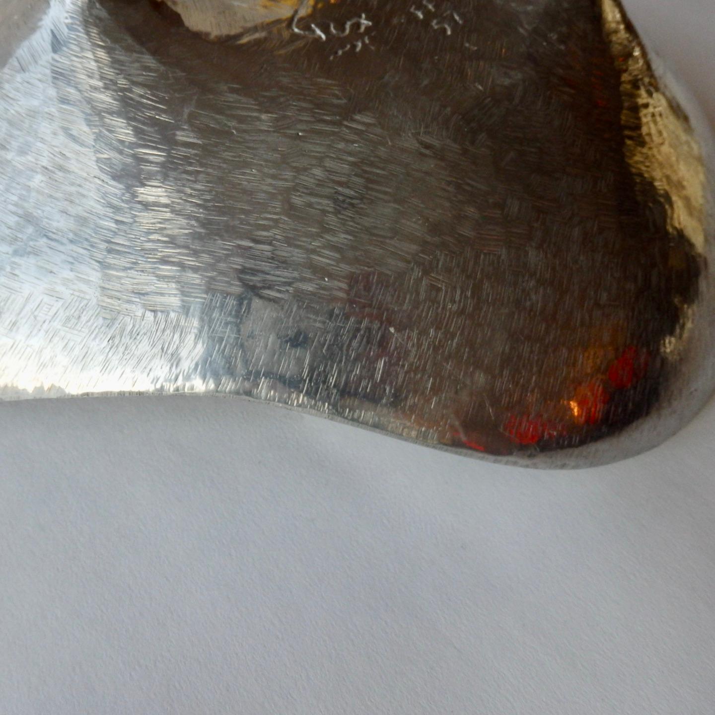 American Bruce Fox organic form polished cast aluminum footed bowl .