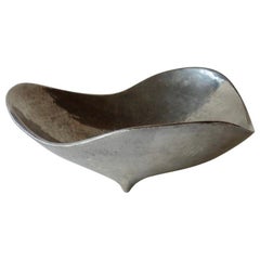 Bruce Fox organic form polished cast aluminum footed bowl . 