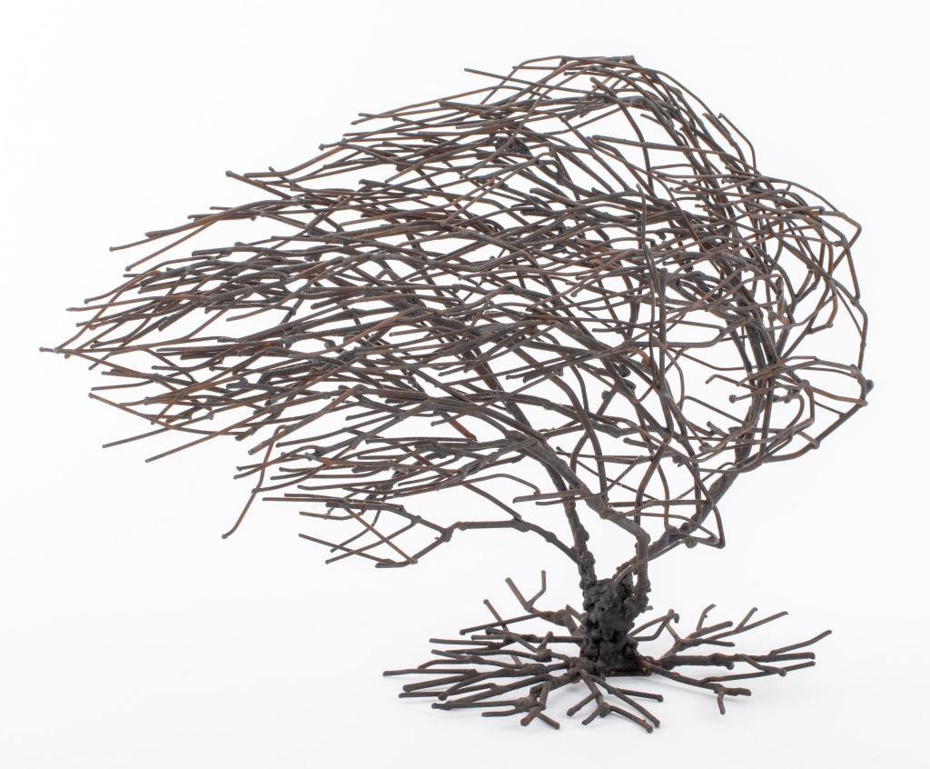 Bruce Friedle (American, XX) Brutalist forged metal sculpture depicting a tree in the wind, signed on plaque to underside. In good vintage condition. Wear consistent with age and use.

Dimensions: 12
