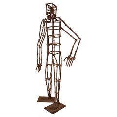 Monumental Iron Figure in Railroad Ties by Bruce Gray
