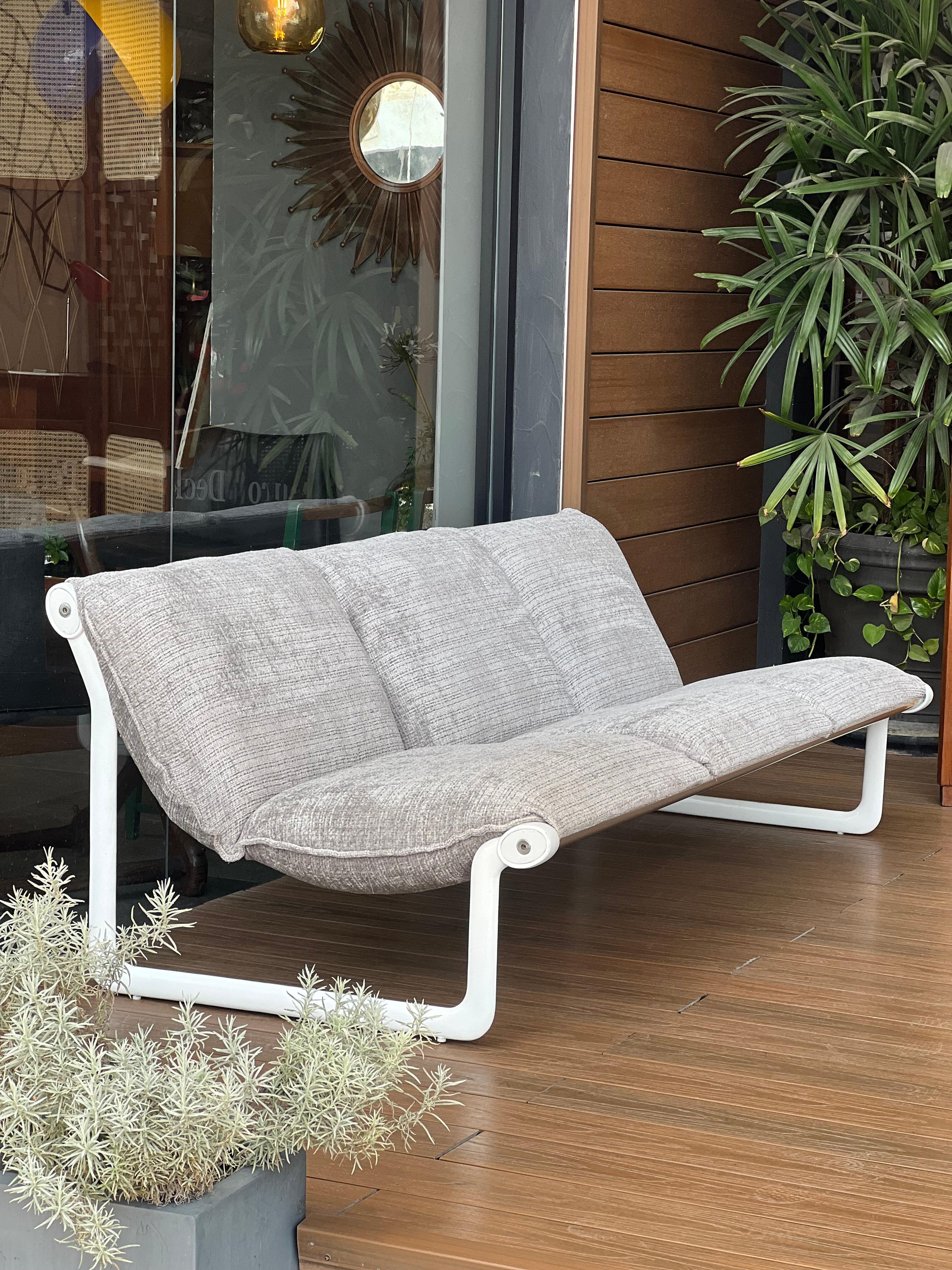 Bruce Hannah and Andrew Morrison for Knoll Int. three-seater Sofa upholstered and the aluminum repainted to its original white, while we preserved the original polished aluminum color on the other frames. 
In another of our posts, we feature the