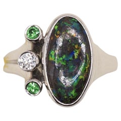 Anillo de cóctel de platino con ópalo negro, tsavorita y diamantes de Bruce Harding