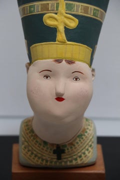 Botero's Nefertete, statue of Nefertete with Botero themed attire