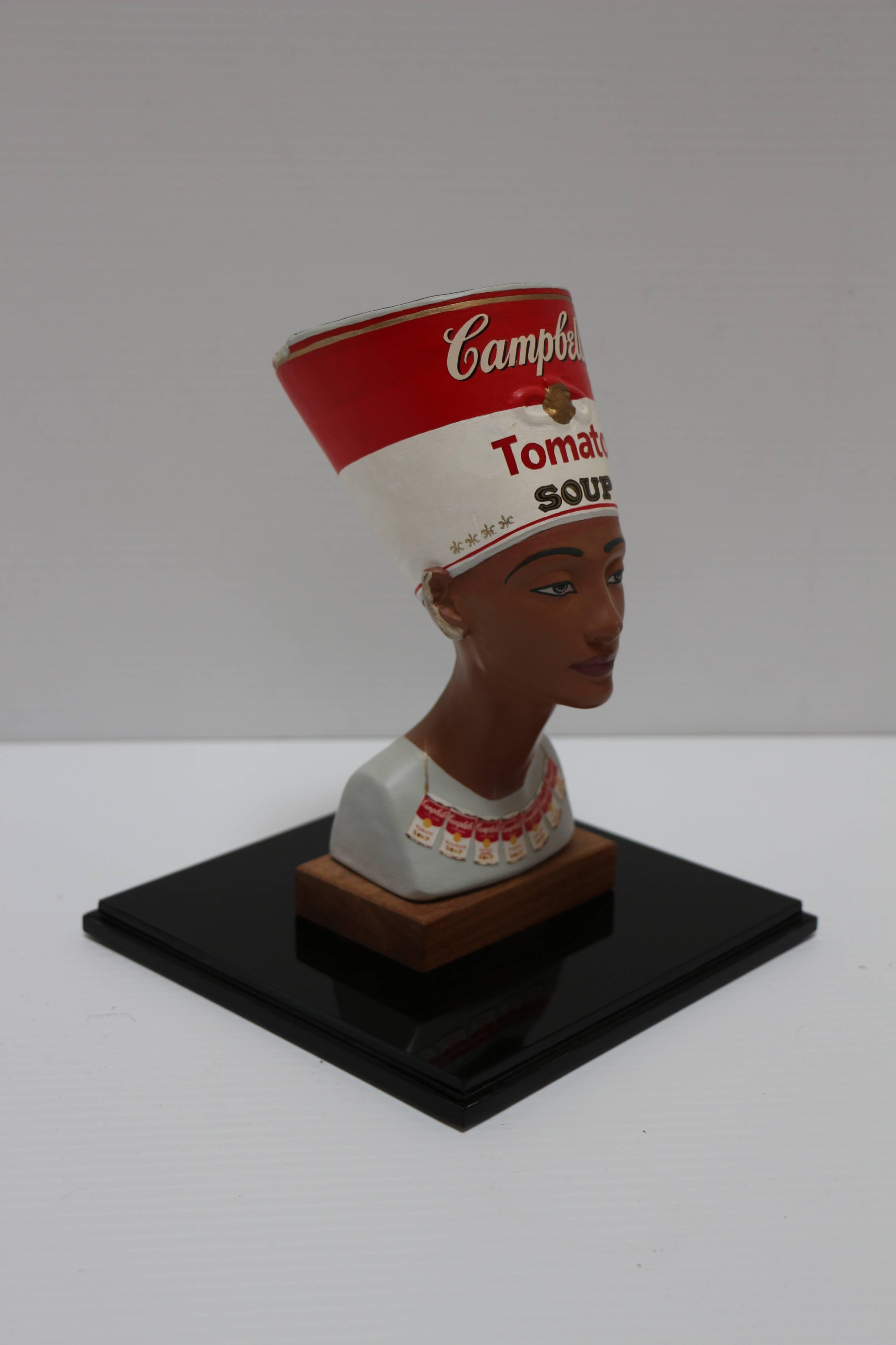 Warhol's Nefertete, statue of Nefertete with Andy Warhol soup themed attire - Modern Sculpture by Bruce Houston