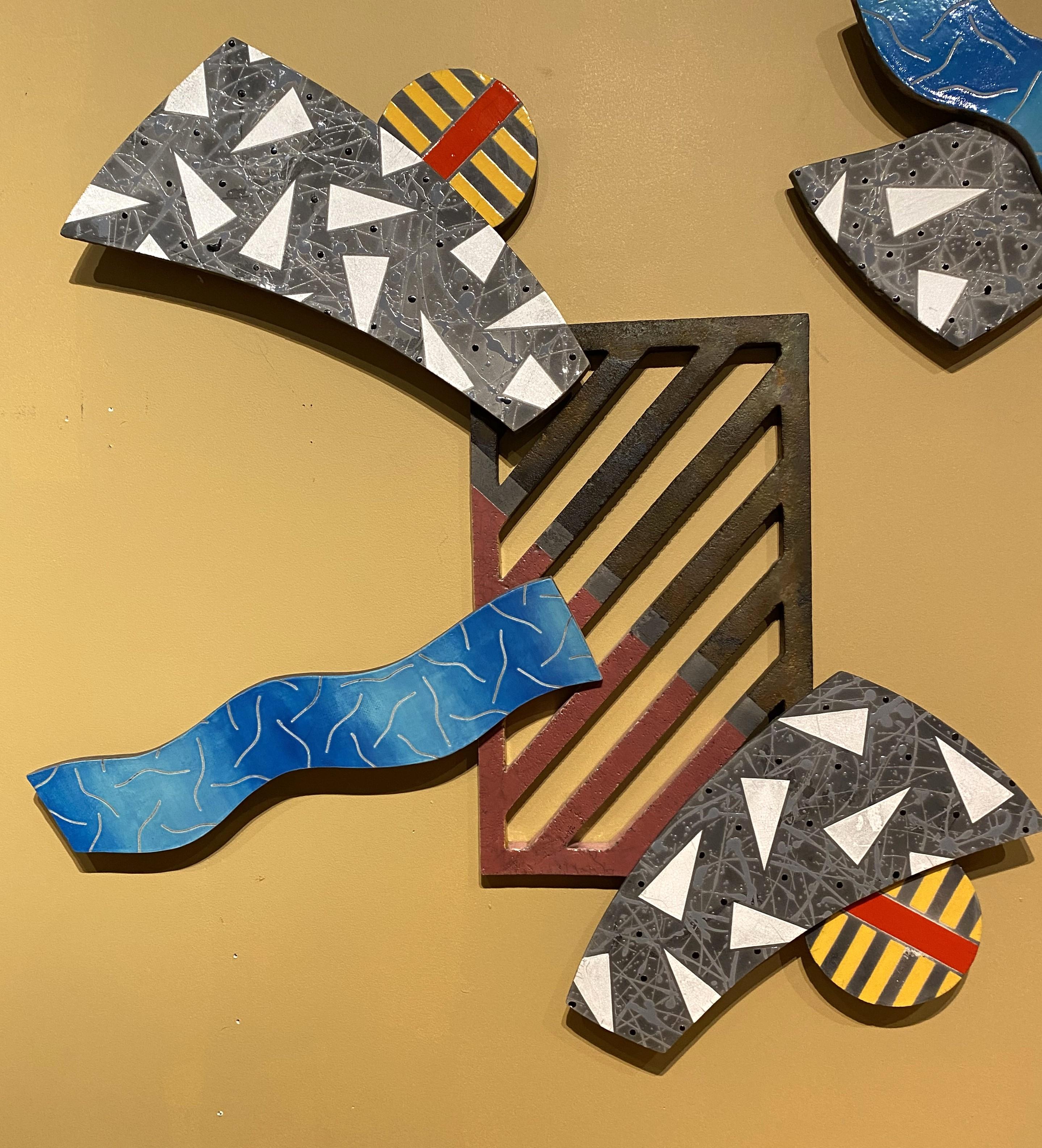 A colorful modernist abstract pottery polychrome wall sculpture, each piece with varying textures, colors, and shapes by American artist and professor Bruce Lenore (b. 1955). Lenore is not only an artist, but was an art teacher at Smithfield High