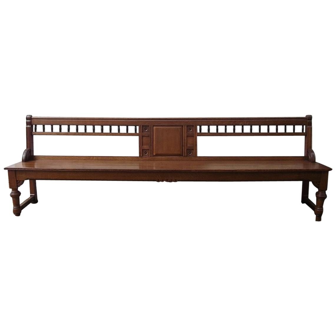Bruce Talbert, attr, a Long Aesthetic Movement Oak Bench with Carved Florets