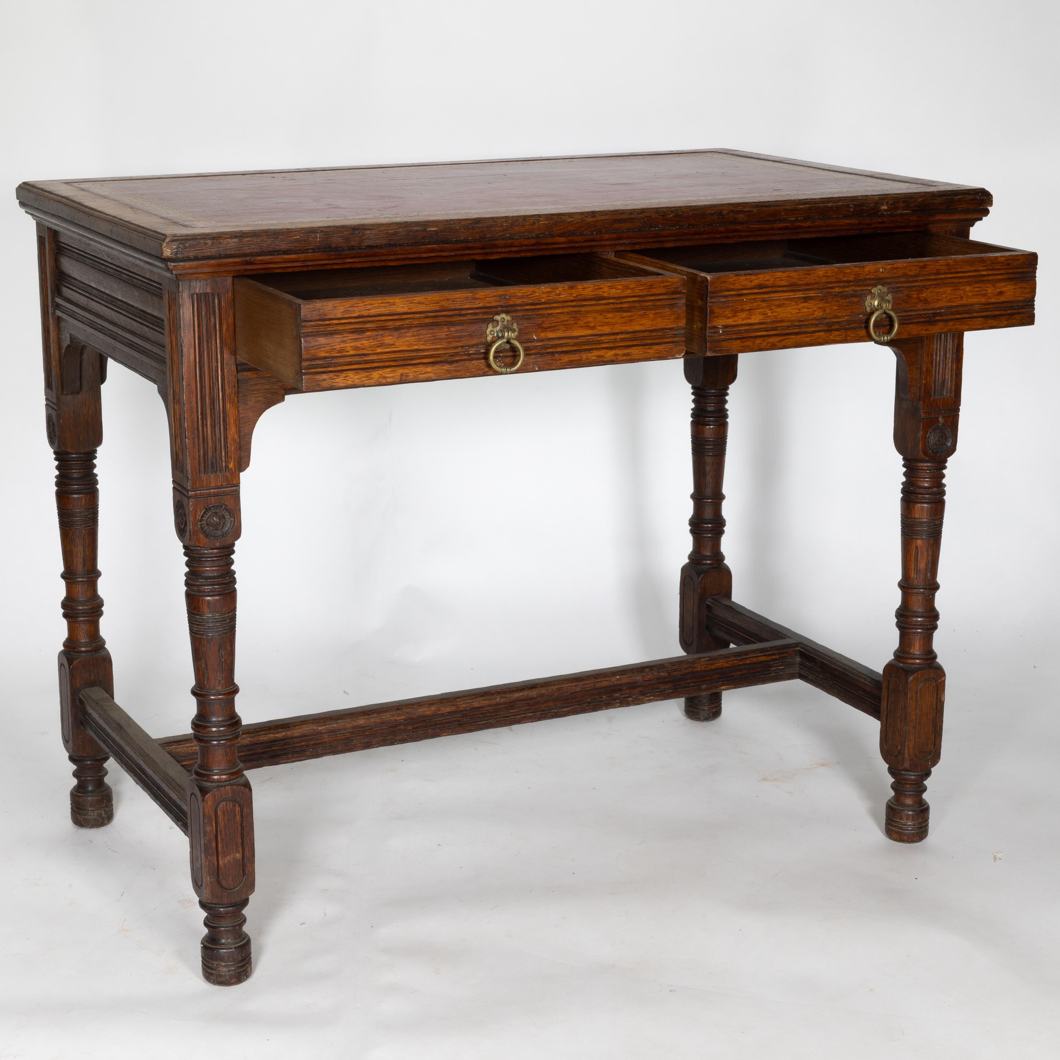 Hand-Crafted Bruce Talbert for Gillow and Co. A Gothic Revival Oak and Leather Writing Table For Sale