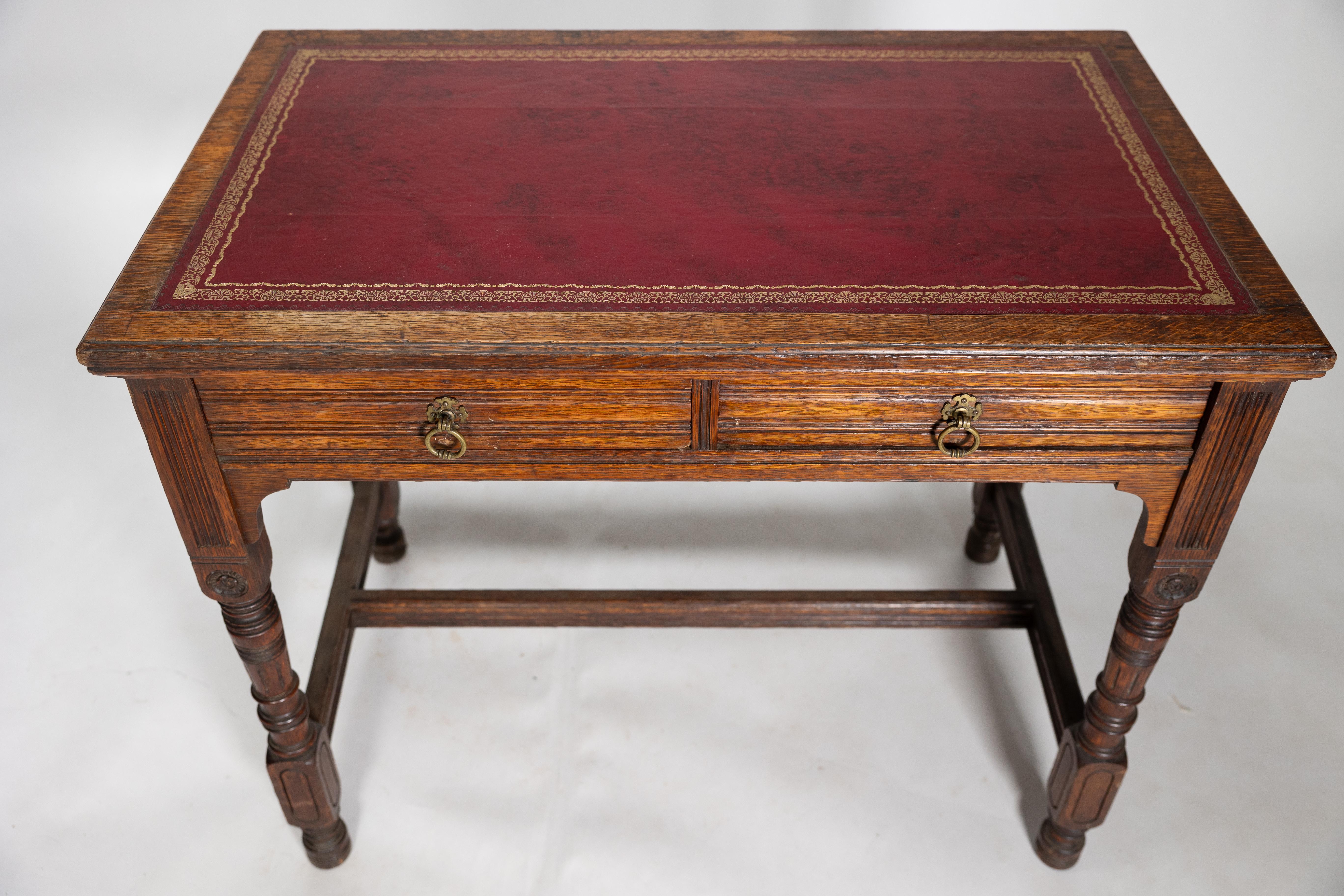 Bruce Talbert for Gillow and Co. A Gothic Revival Oak and Leather Writing Table For Sale 1