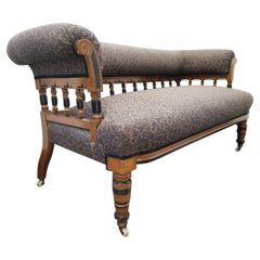 Bruce Talbert, per Gillows: Aesthetic Movement Settee in legno ebanizzato e dorato