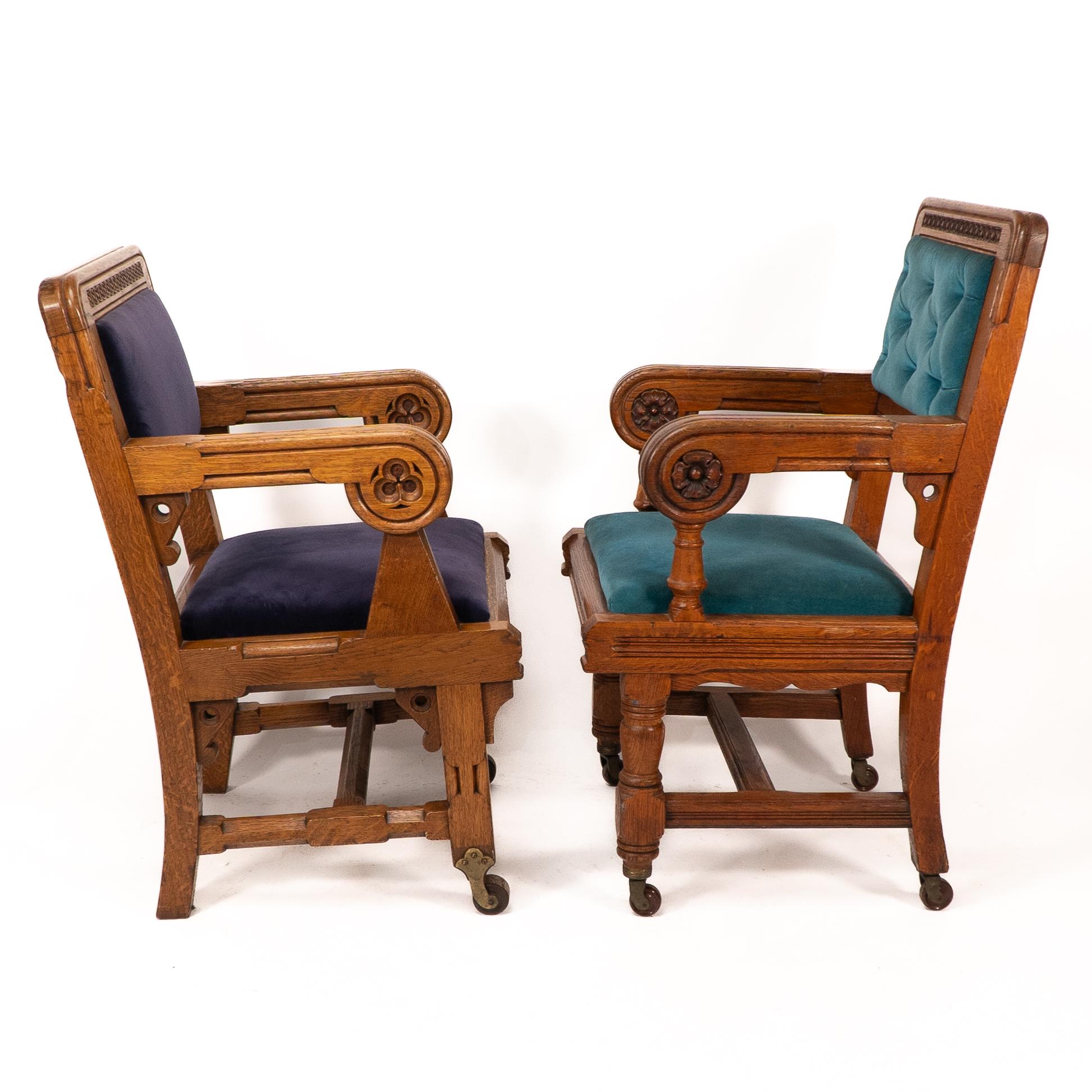 Bruce Talbert. Gillows of Lancaster. 
Two rare Gothic Revival armchairs.
*The two with dark and light blue upholstery shown here are available, the one with brown upholstery is now sold*.
The two blue ones are almost identical except one has square