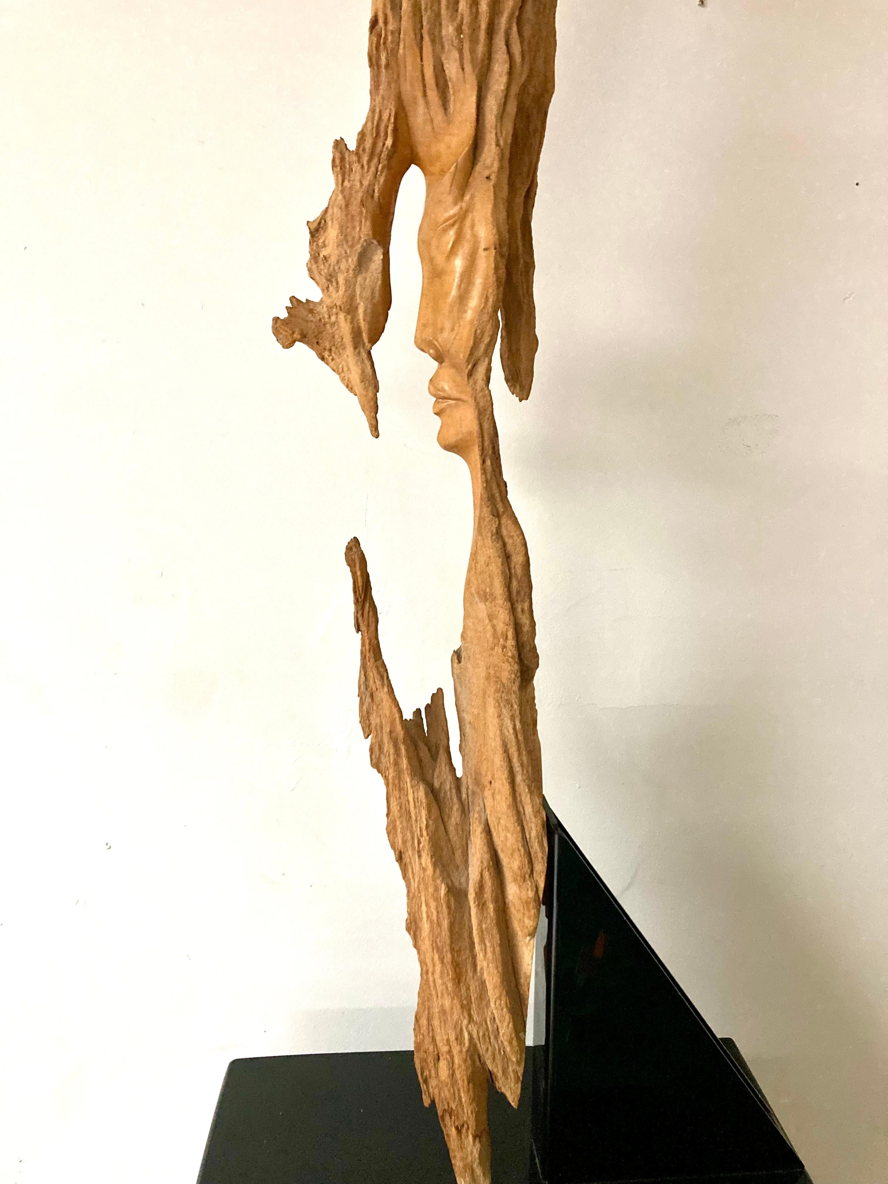 This is an wooden sculpture by Bruce Turnbull. The sculpture is in excellent condition. The podium is made of plexiglass and comes with the sculpture. If you have any questions please ask.  The podium Measures 36x17x10 and the sculpture is 45 inches