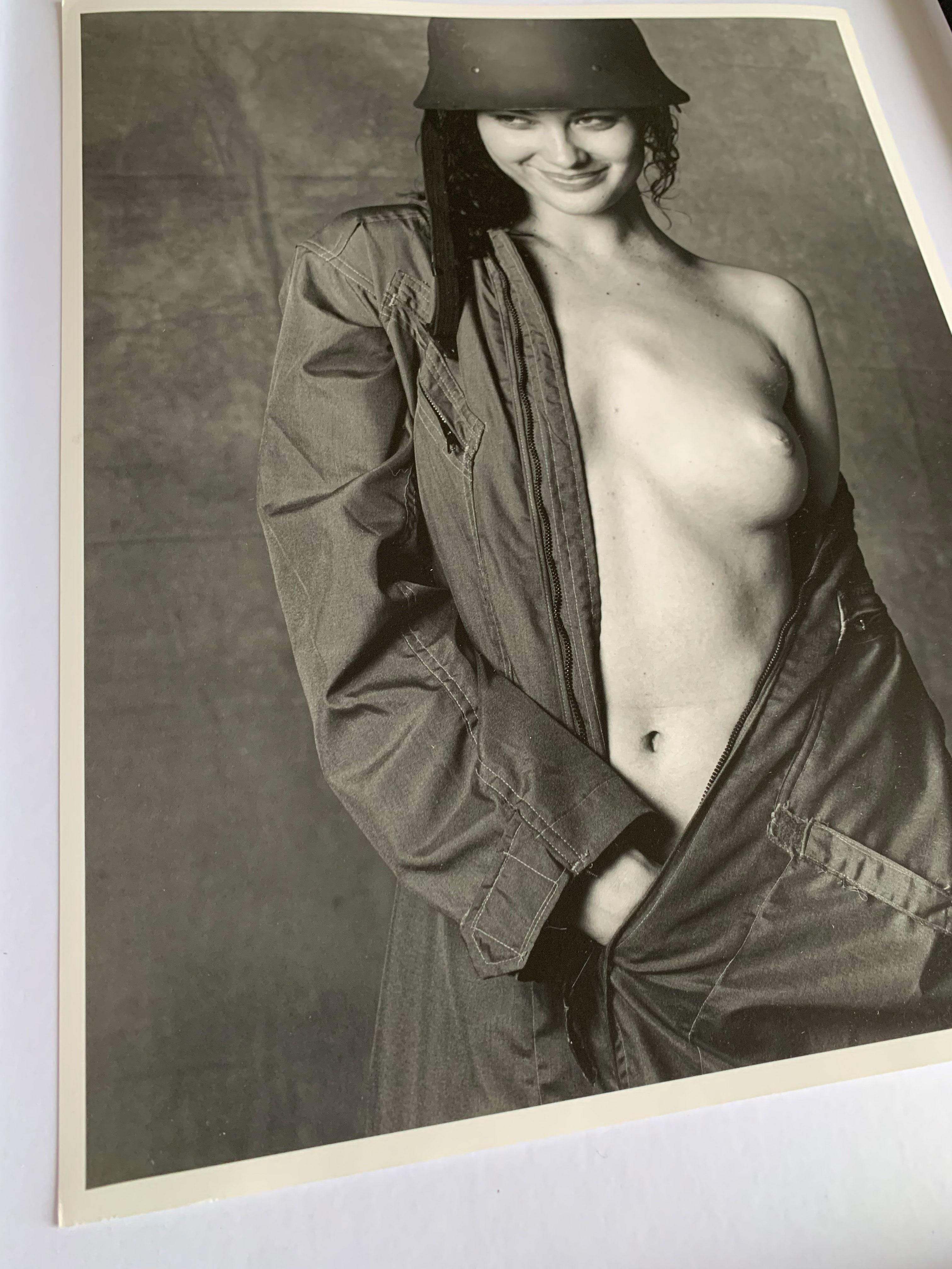 Shalom Harlow - Nude in army outfit - for the 1998 Pirelli Cal, Model portrait - Contemporary Photograph by Bruce Weber