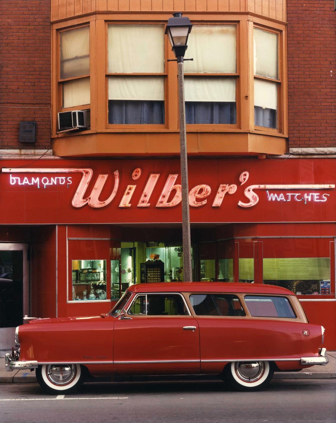 Bruce Wrighton Color Photograph - 1953 Nash Rambler, Wilber's Jewelers, Johnson City, NY