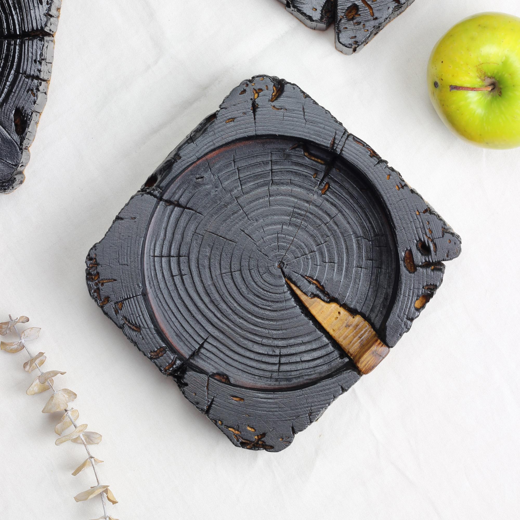 Elegantly crafted, these wooden trays—ideal for jewelry or as desk organizers—are fashioned from timeworn barn beam wood. They undergo the traditional Japanese Yakisugi burning technique and are meticulously treated with natural oils, then