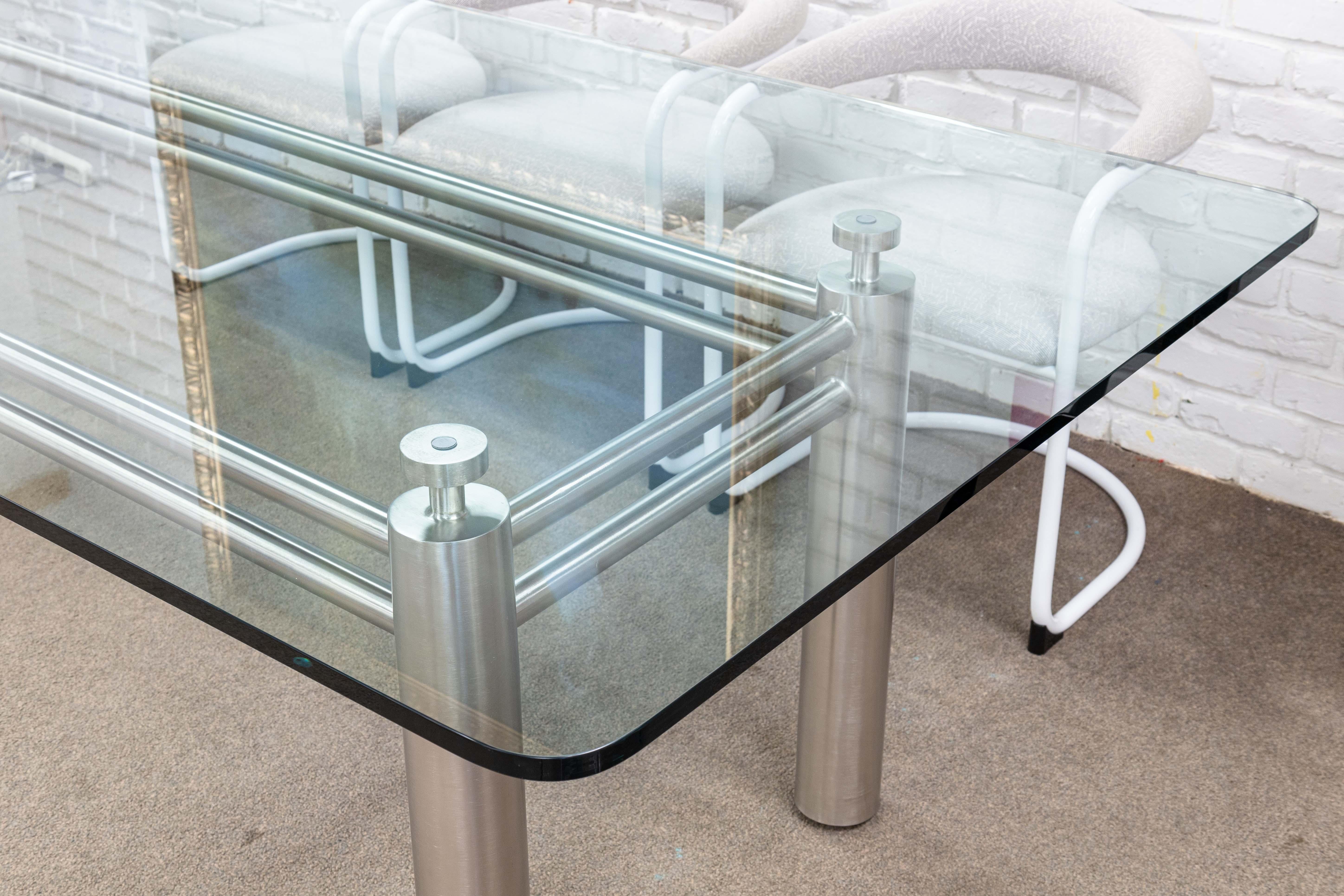 Brueton Contemporary Modern Stainless Steel and Glass Dining Room Table w Wheels In Good Condition For Sale In Keego Harbor, MI