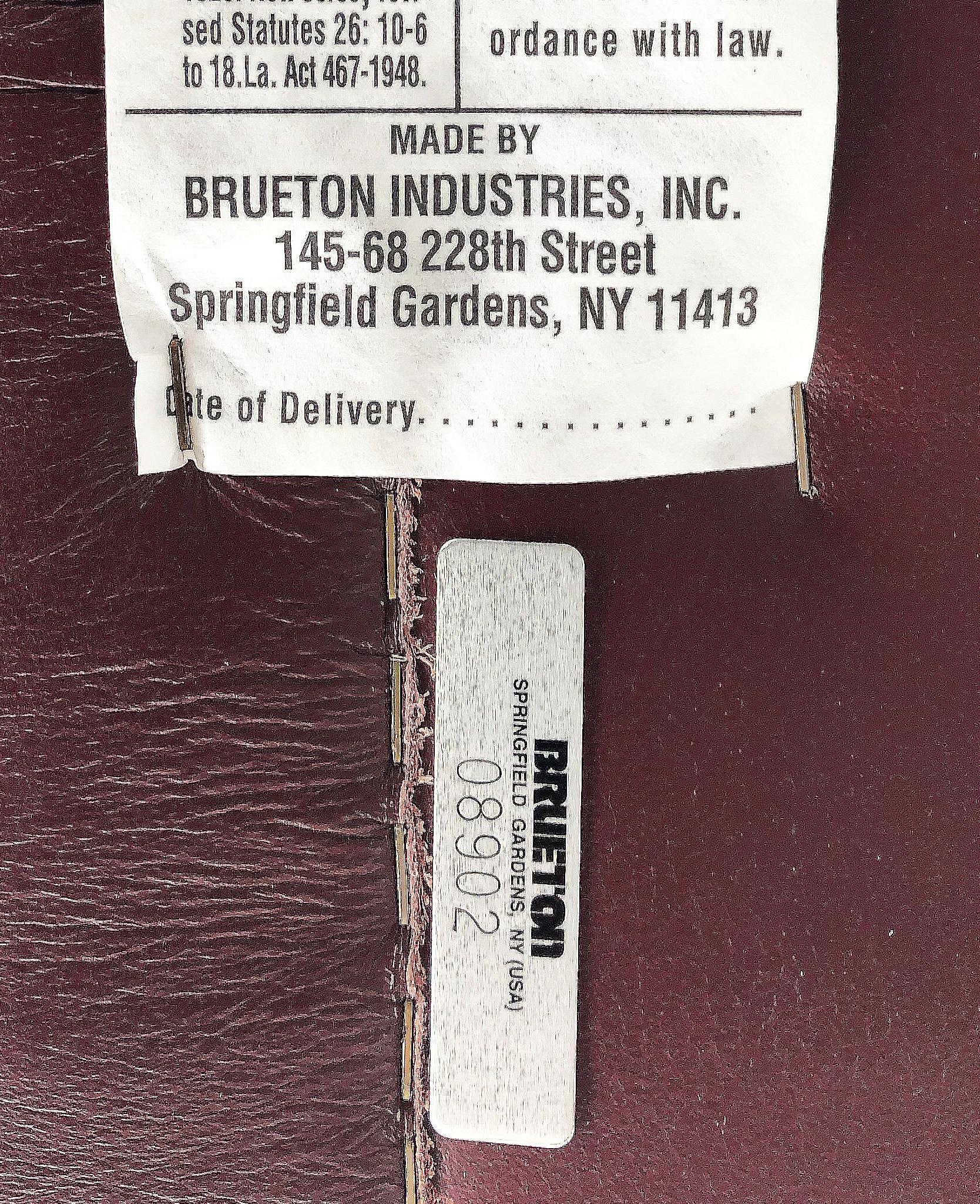 Brueton Leather and Stainless Cantilevered Chairs, Set of 8 In Good Condition For Sale In Miami, FL