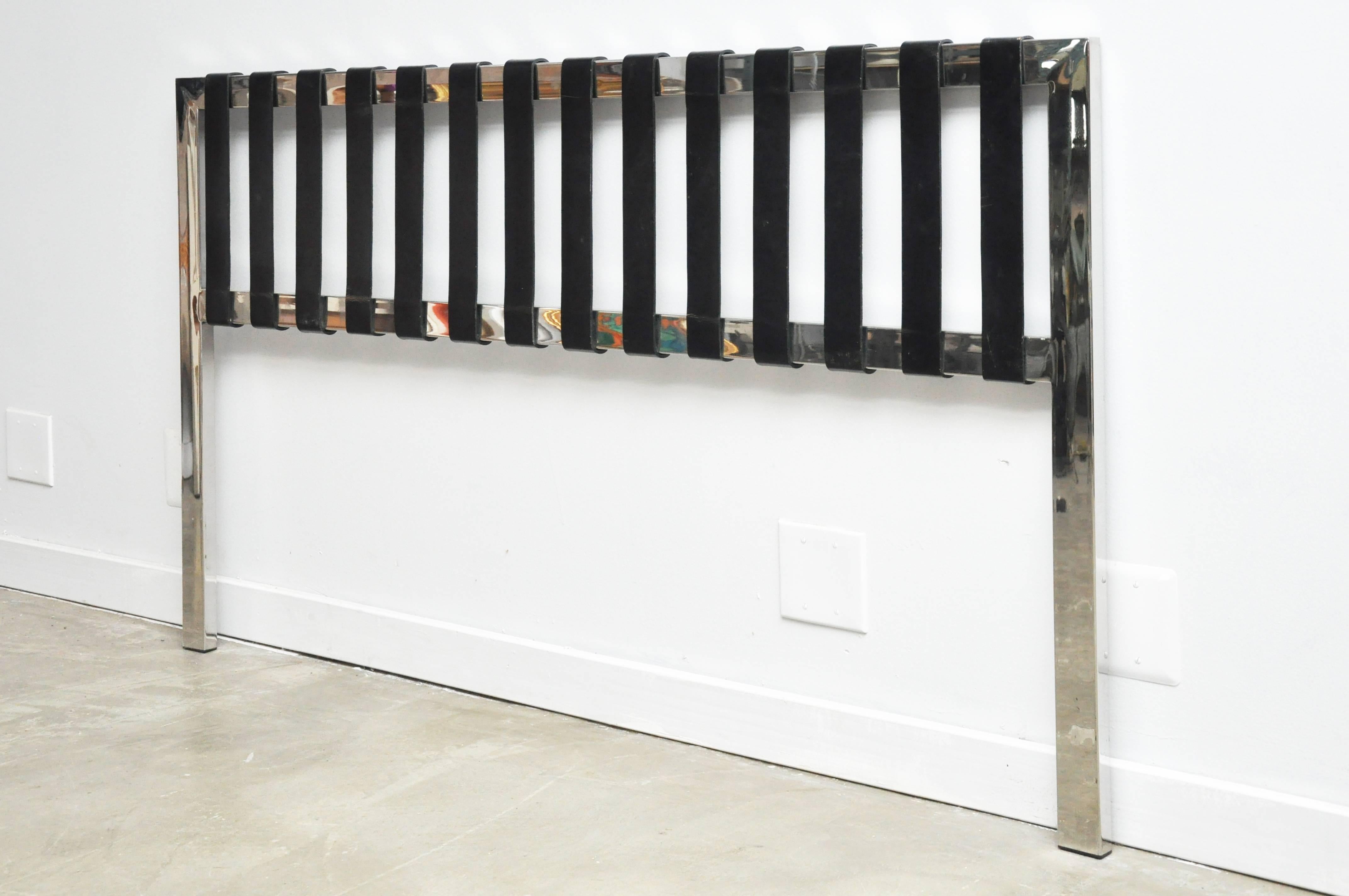 Stainless steel headboard with black leather strapping by Brueton. Queen-size.

 