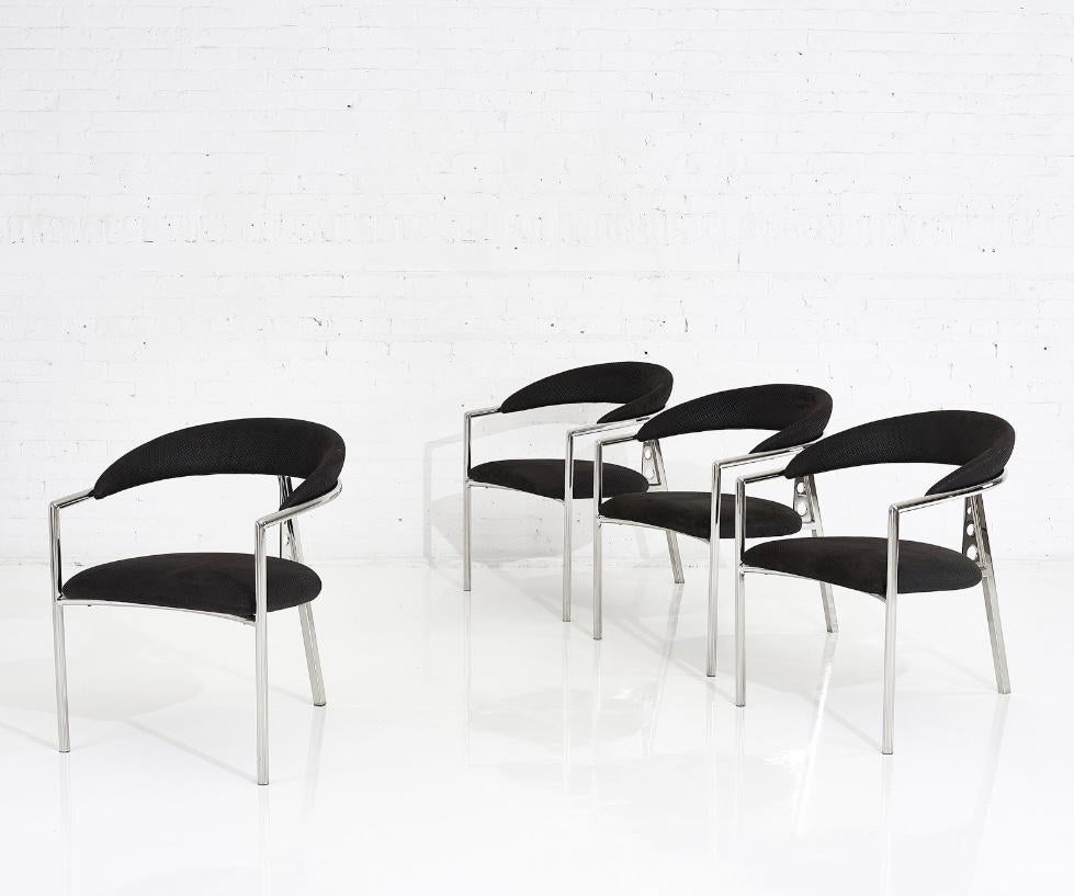 Brueton Post Modern Tripod Chairs, 1980’s. Stainless steel 3 leg frames with original black checkered postmodern upholstery.