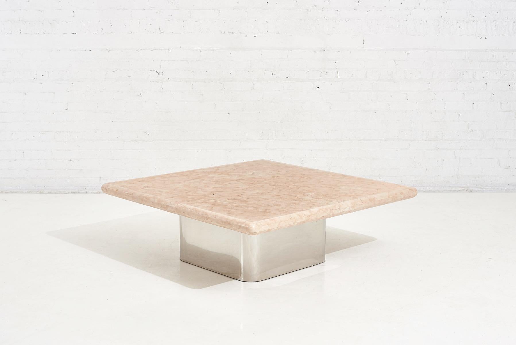 Brueton stainless steel base pink marble top coffee table, 1980.
 