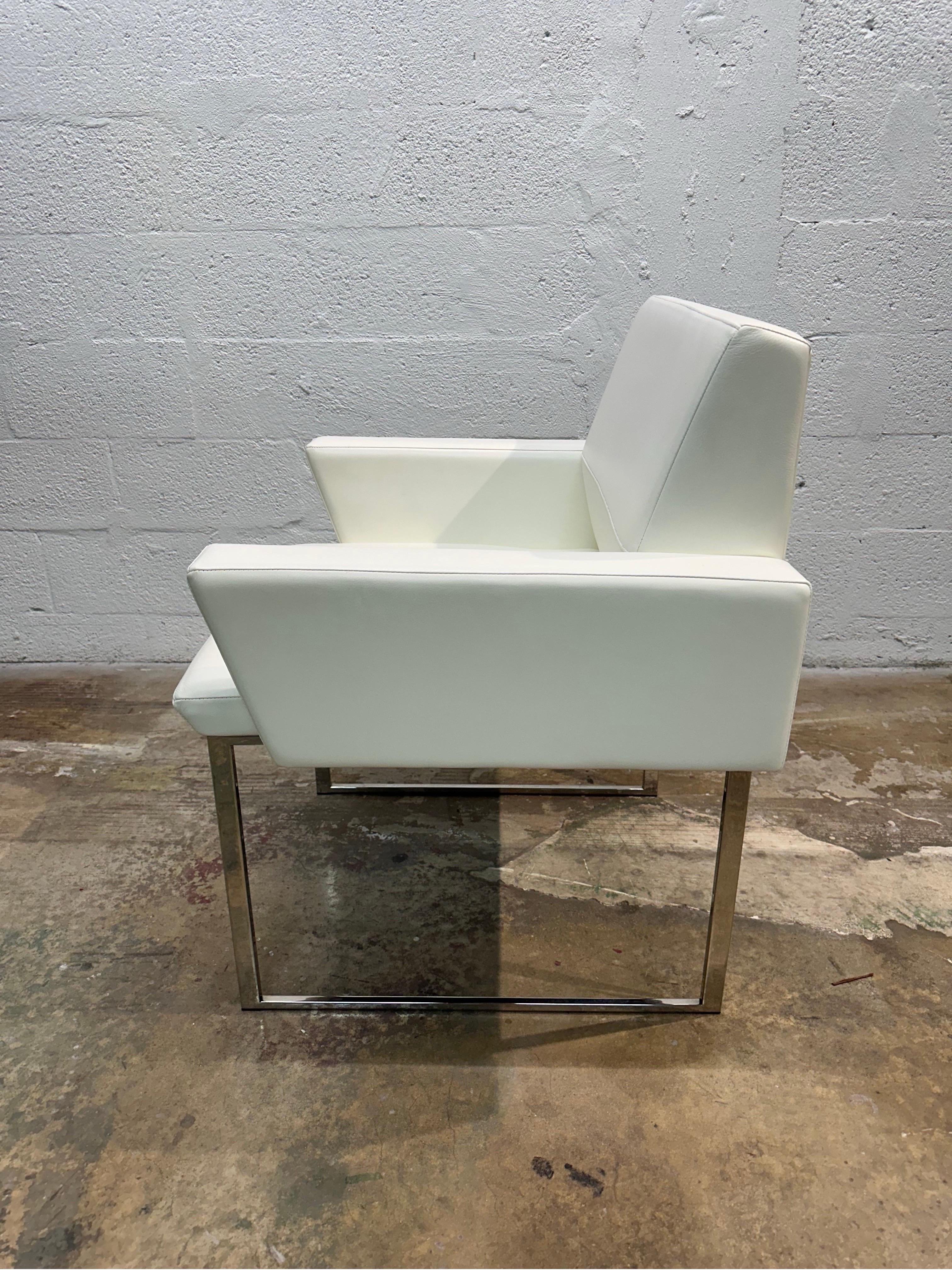 Steel Brueton White Naugahyde and Chrome Frame Dining Arm Chairs - Ten Available For Sale