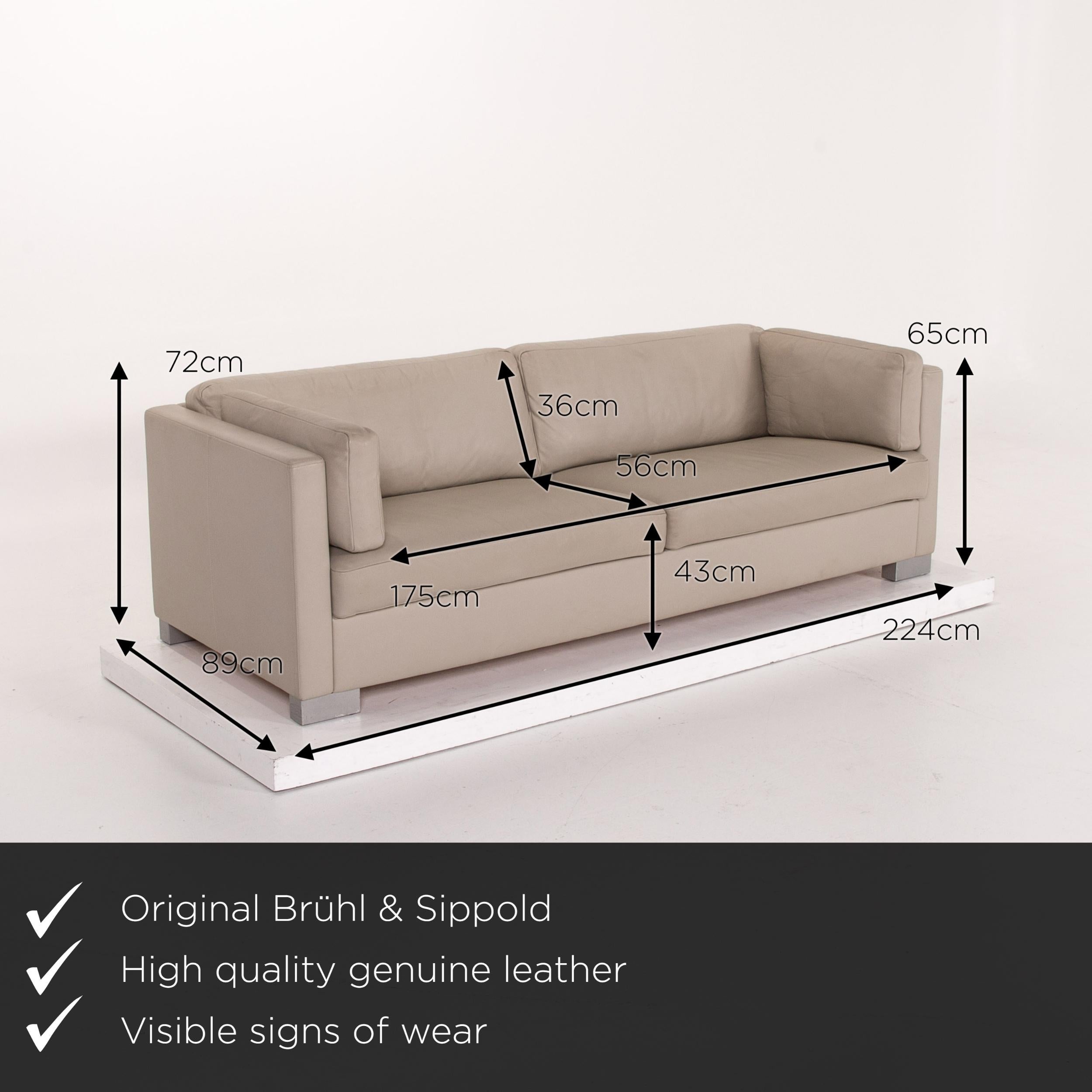 We present to you a Brühl & Sippold leather sofa set gray gray beige 1 three-seat 1 stool.
 

 Product measurements in centimeters:
 

Depth 89
Width 224
Height 72
Seat height 43
Rest height 65
Seat depth 56
Seat width 175
Back height