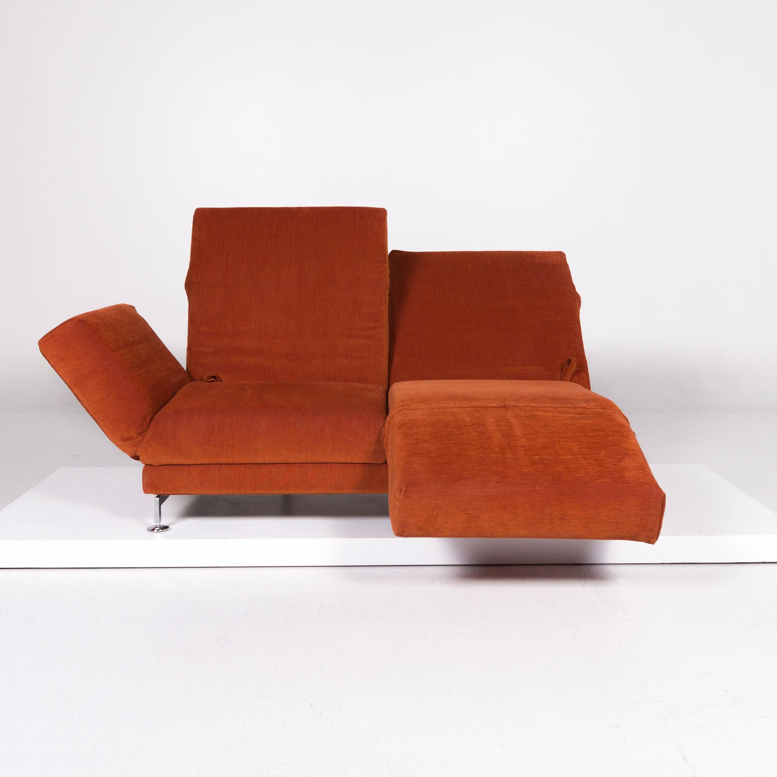 We bring to you a Brühl & Sippold Moule fabric sofa orange two-seat incl. function.

 Product measurements in centimeters:
 
Measures: Depth 95
Width 185
Height 45
Seat-height 40
Rest-height 40
Seat-depth 55
Seat-width 140
Back-height
