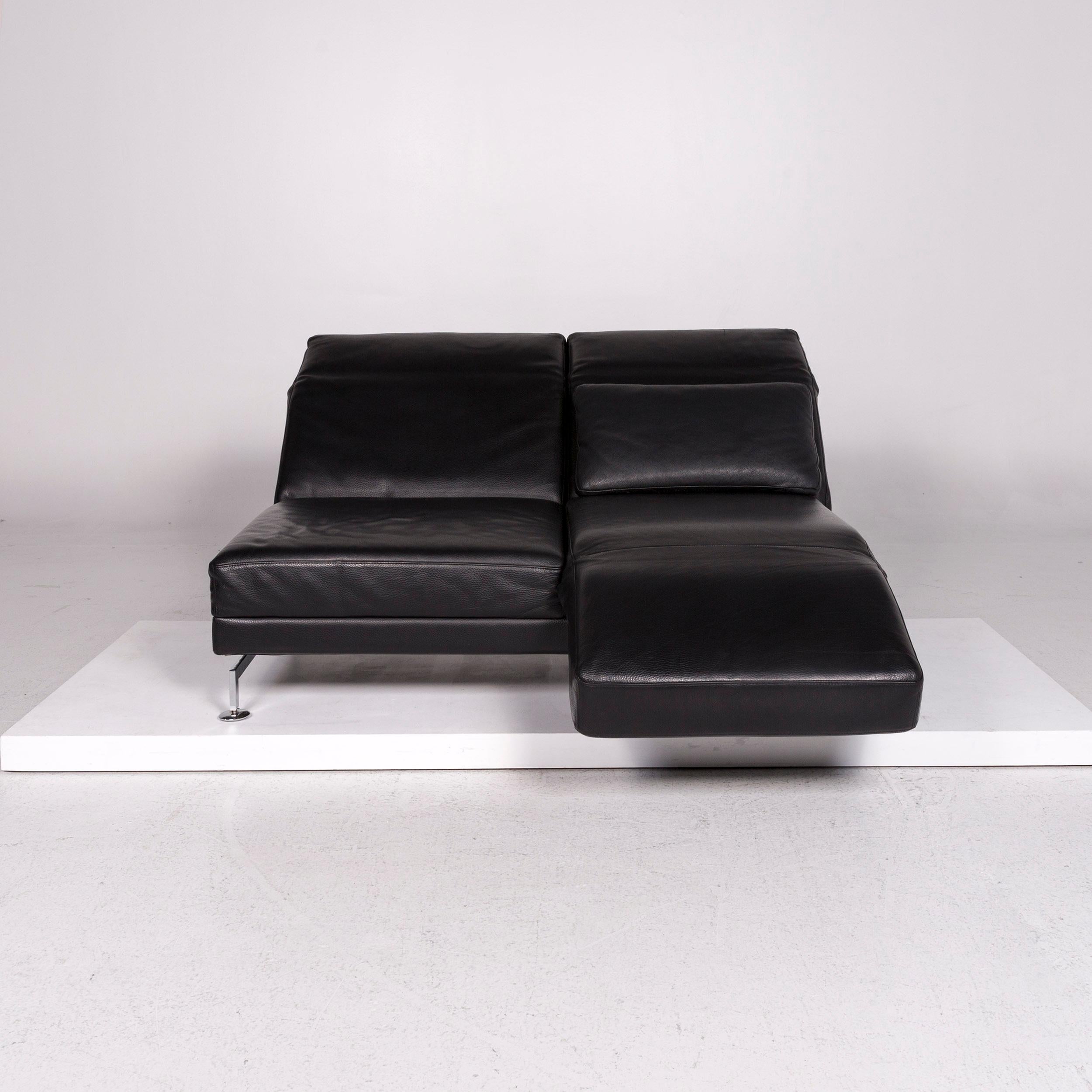 We bring to you a Brühl & Sippold Moule leather sofa black two-seat relax function couch.

 

 Product measurements in centimeters:
 

Depth 90
Width 170
Height 90
Seat-height 40
Rest-height 70
Seat-depth 70
Seat-width 145
Back-height