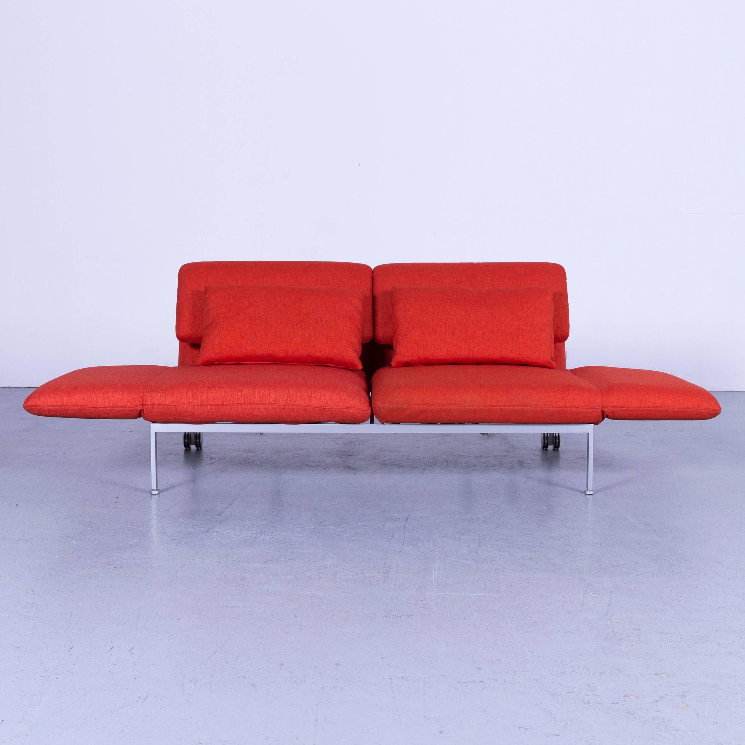 Brühl & Sippold Roro designer bed sofa in red orange fabric with great functions.