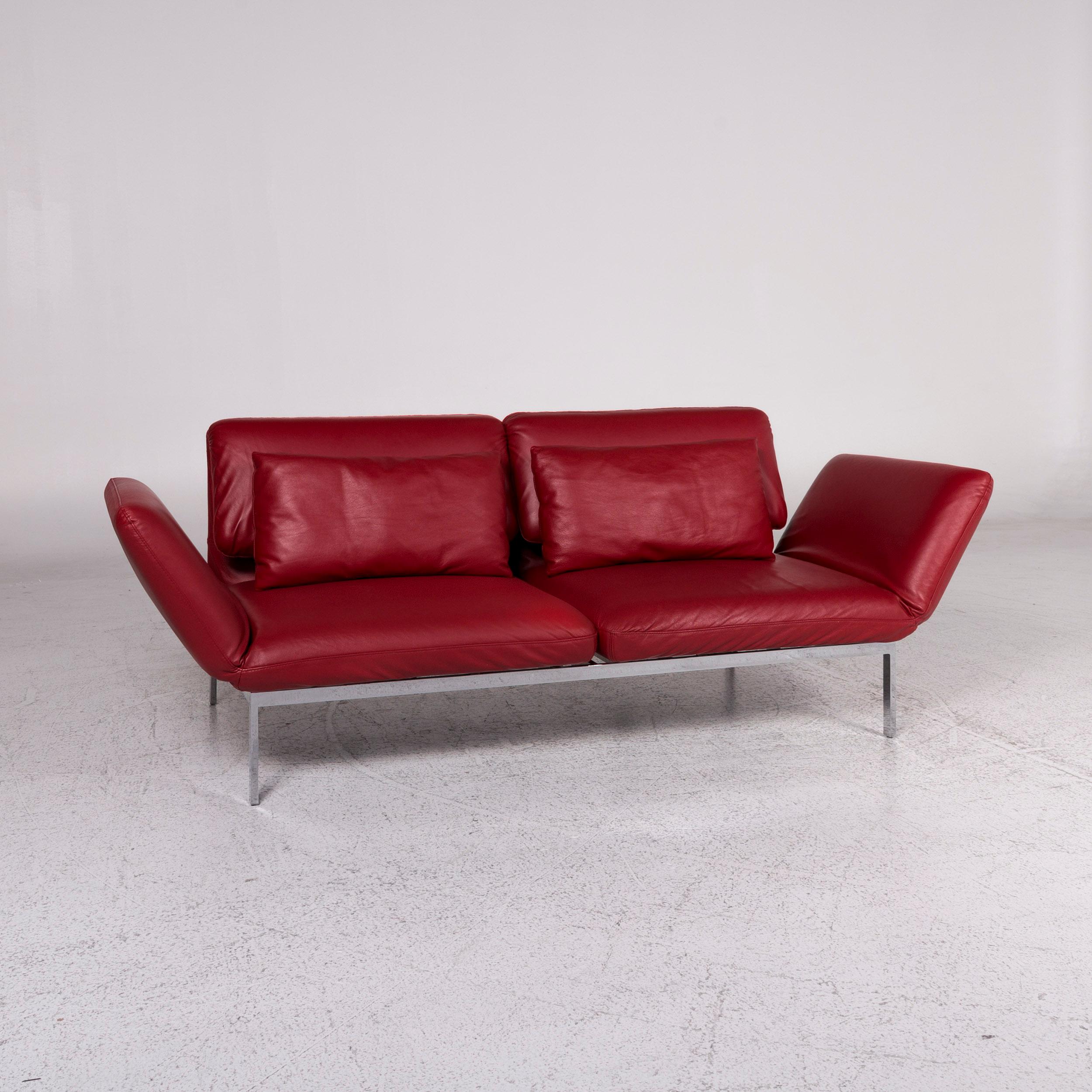 We bring to you a Brühl & Sippold Roro designer leather sofa red two-seat relax function couch.
 
Product measurements in centimetres:
 
Depth 86
Width 183
Height 77
Seat-height 38
Rest-height 35
Seat-depth 100
Seat-width 145
Back-height