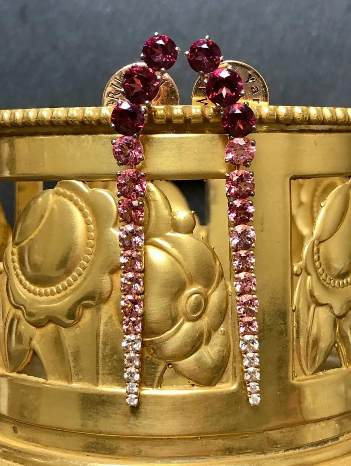 These stunning Brumani earrings are the perfect addition to any jewelry collection. Crafted from 18k rose gold, they feature dangle/drop style with a beautiful combination of pink topaz, tourmaline, and round diamonds. The pushback drop closure
