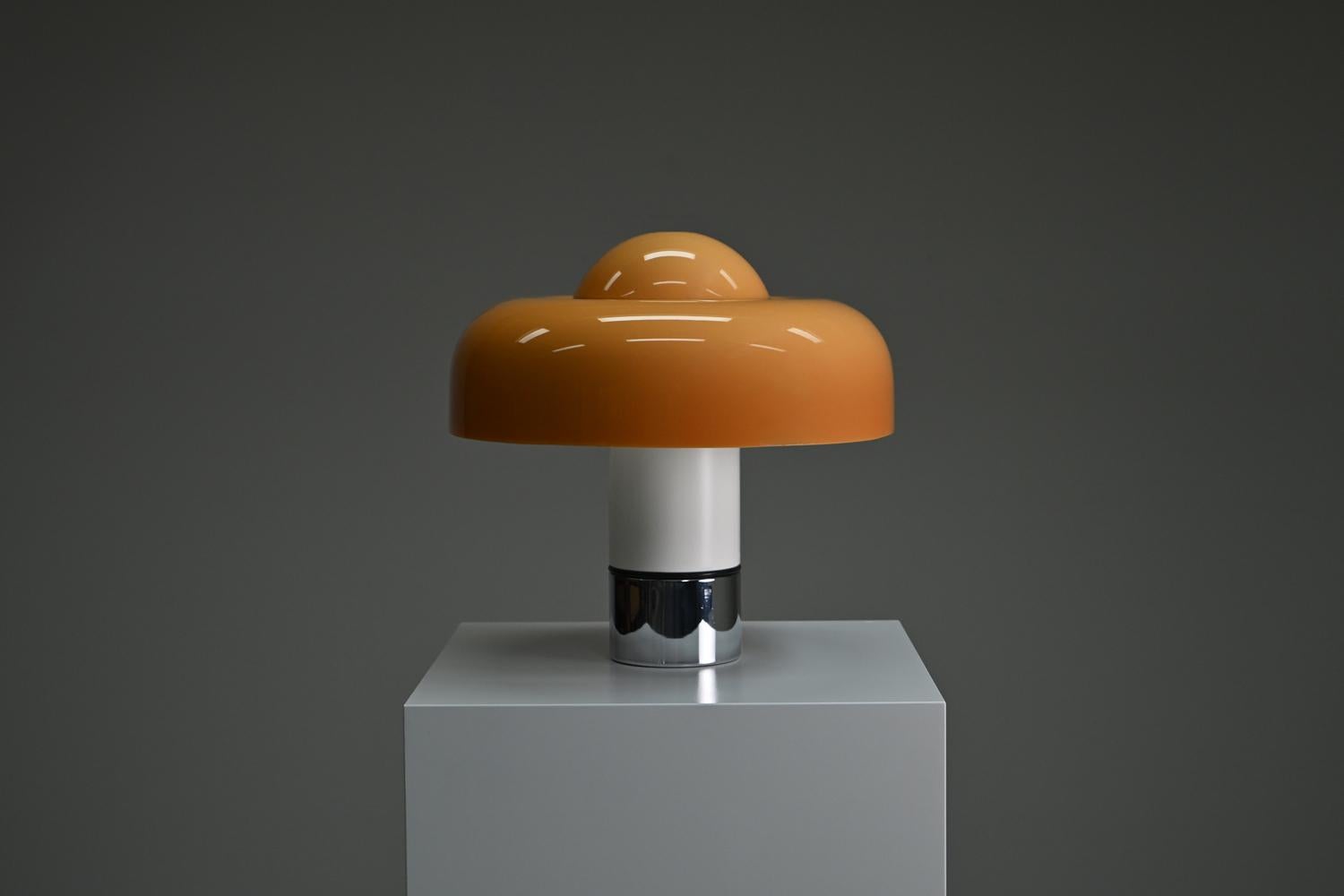 Brumbry table lamp by Luigi Massoni for Harvey Guzzini, 1960s Italy. The Brumbry table lamp is a true Italian design classic from the late 1960s and 1970s. Designed by Luigi Massoni in 1969, this lamp is instantly recognizable for its playful