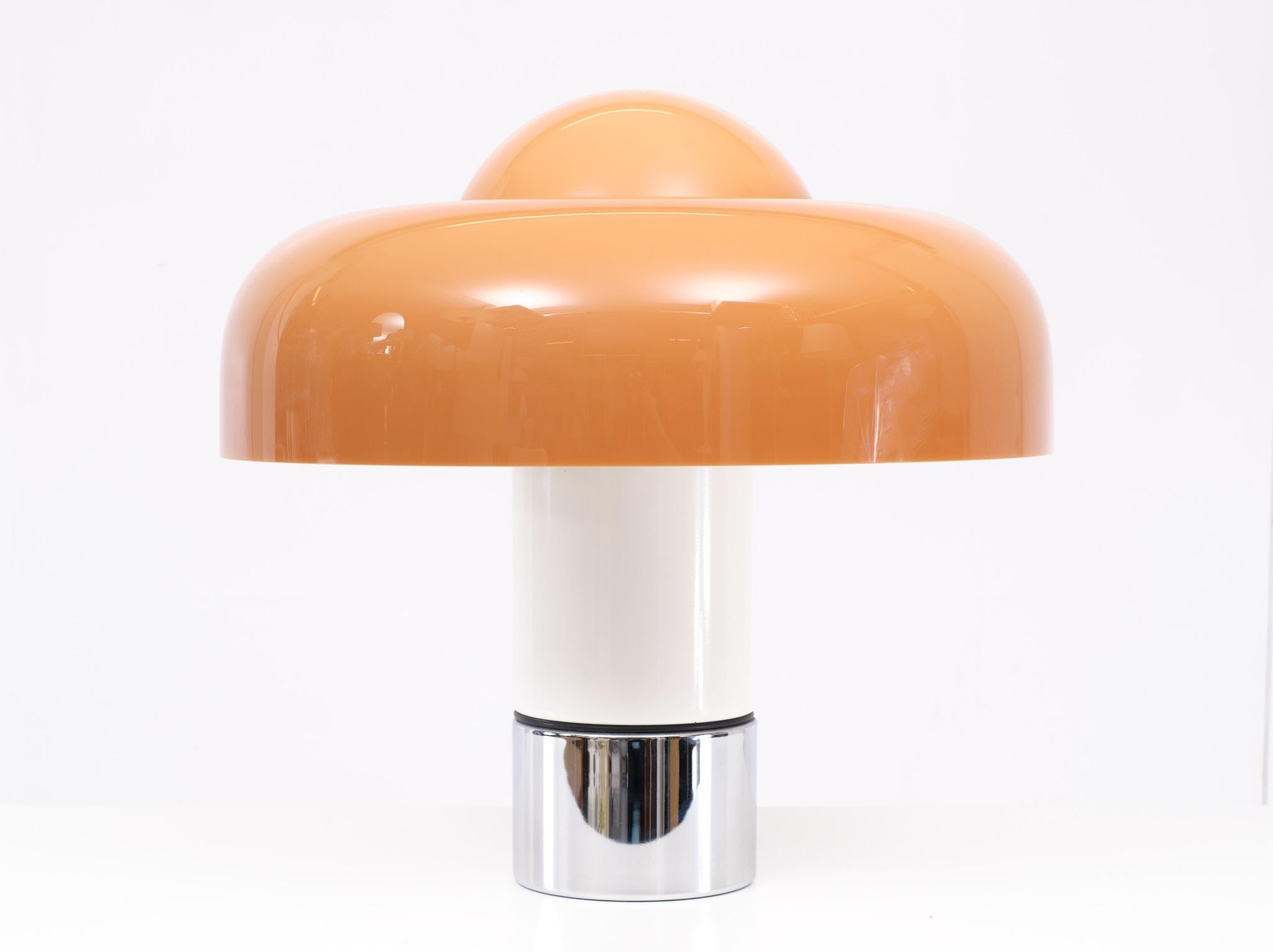 Design classic  table lamp .in a Beautiful Caramel color .This Brumbry (Brumbury) table lamp was designed in 1969 by Luigi Massoni. The lamp has a Perspex dome in Caramel , a white inside chromed steel foot and a white lacquered aluminum base. The
