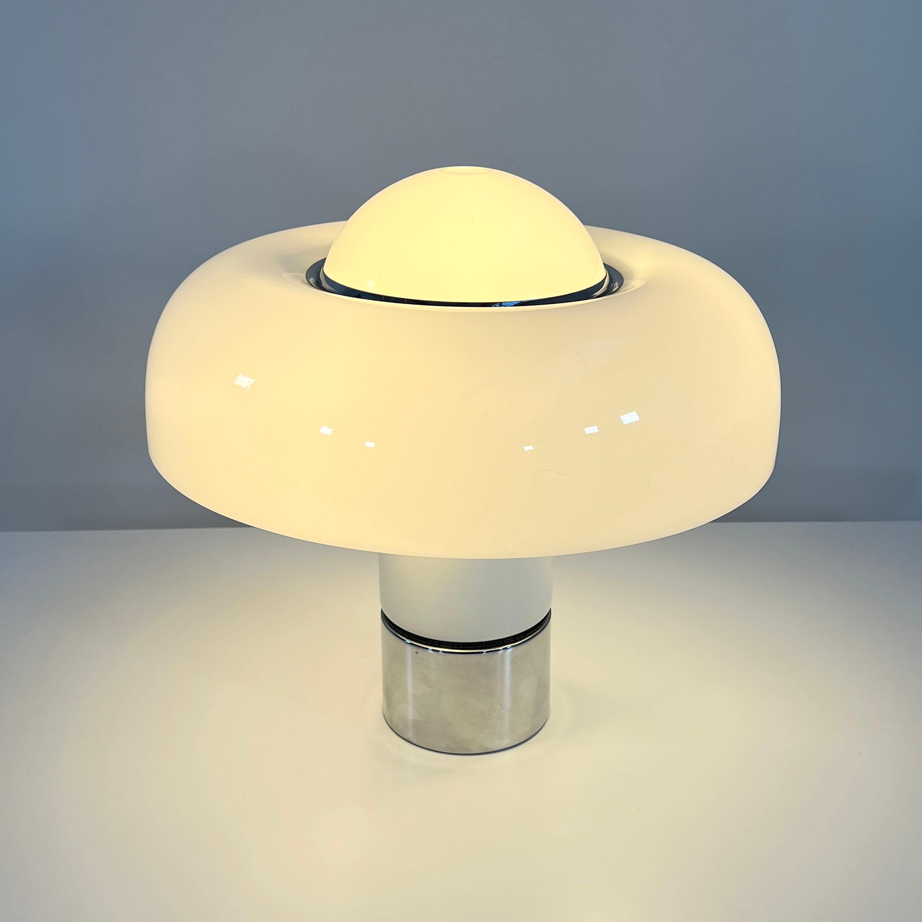 Designer - Luigi Massoni
Producer - Guzzini
Model - Brumbury Table Lamp
Design Period - Seventies
Measurements - Width 50 cm x Depth 50 cm x Height 50 cm 
Materials - Perspex plastic, chrome plating, metal 
Color - White, Silver
Light wear