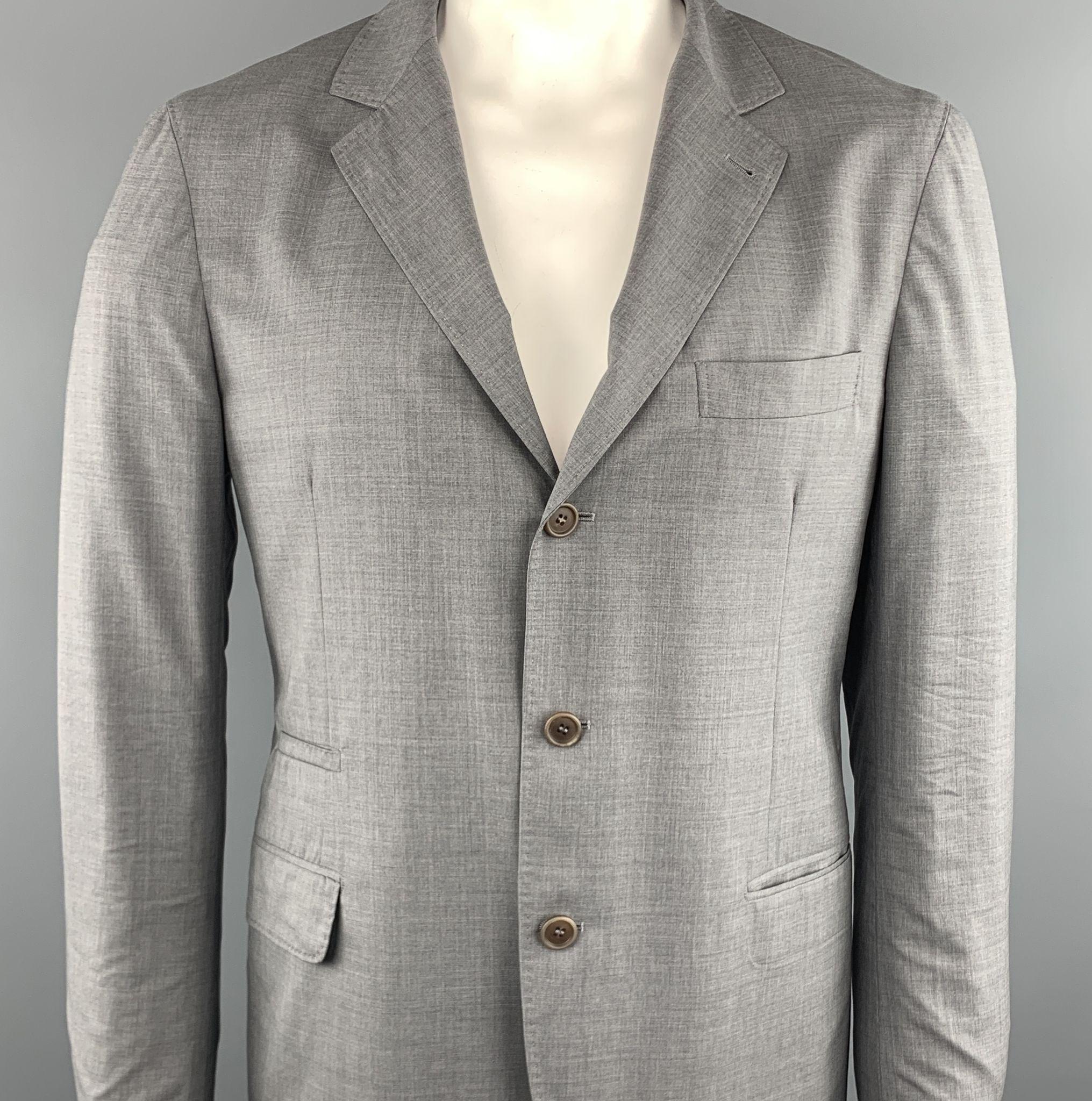 BRUNELLO CUCINELLI sport coat comes in a gray wool and silk featuring a notch lapel style, three buttoned closure, and flap pockets. Made in Italy.
 
Excellent Pre-Owned Condition.
Marked: 54
 
Measurements:
 
Shoulder: 19 in.
Chest: 39 in.
Sleeve: