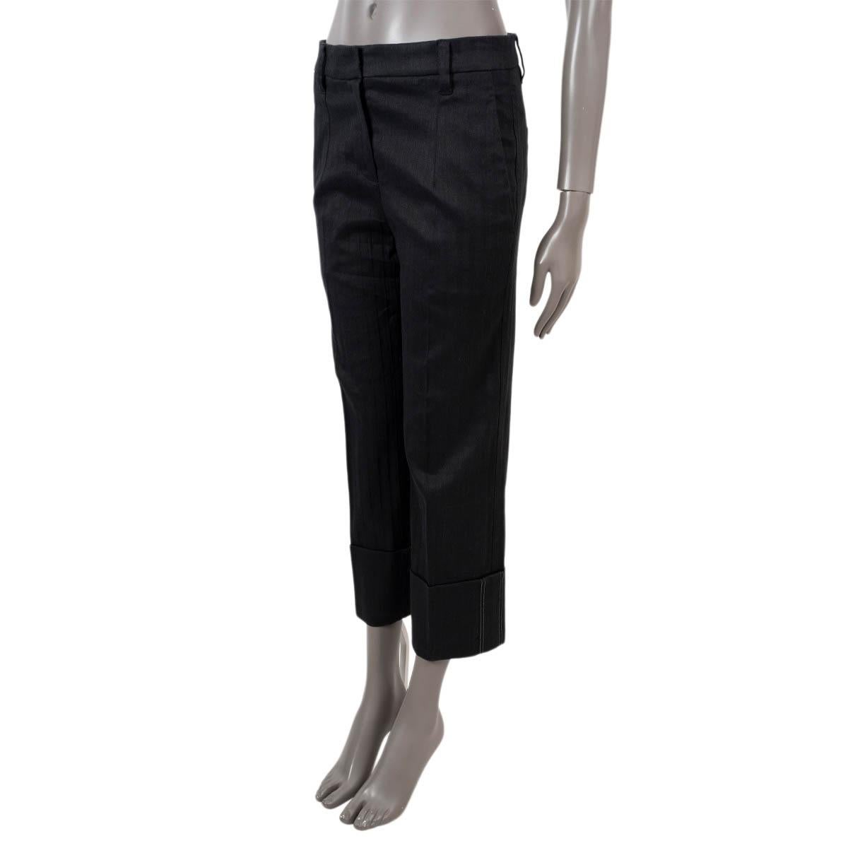 100% authentic Brunello Cucinelli cuffed herringbone pants in anthracite cotton (50%), linen (49%) and elastane (1%). The design features Monili details on the cuffs, belt loops, side slit pockets and back pockets. Unlined. Have been worn and are in