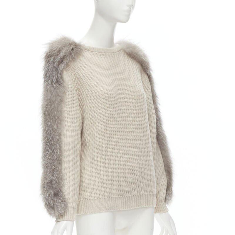 BRUNELLO CUCINELLI beige 100% cashmere grey fox fur sleeve waffle knit sweater M
Reference: TGAS/B02188
Brand: Brunello Cucinelli
Material: 100% Cashmere
Color: Beige, Grey
Pattern: Solid
Extra Details: Genuine fox fur trimming on sleeves.
Made in: