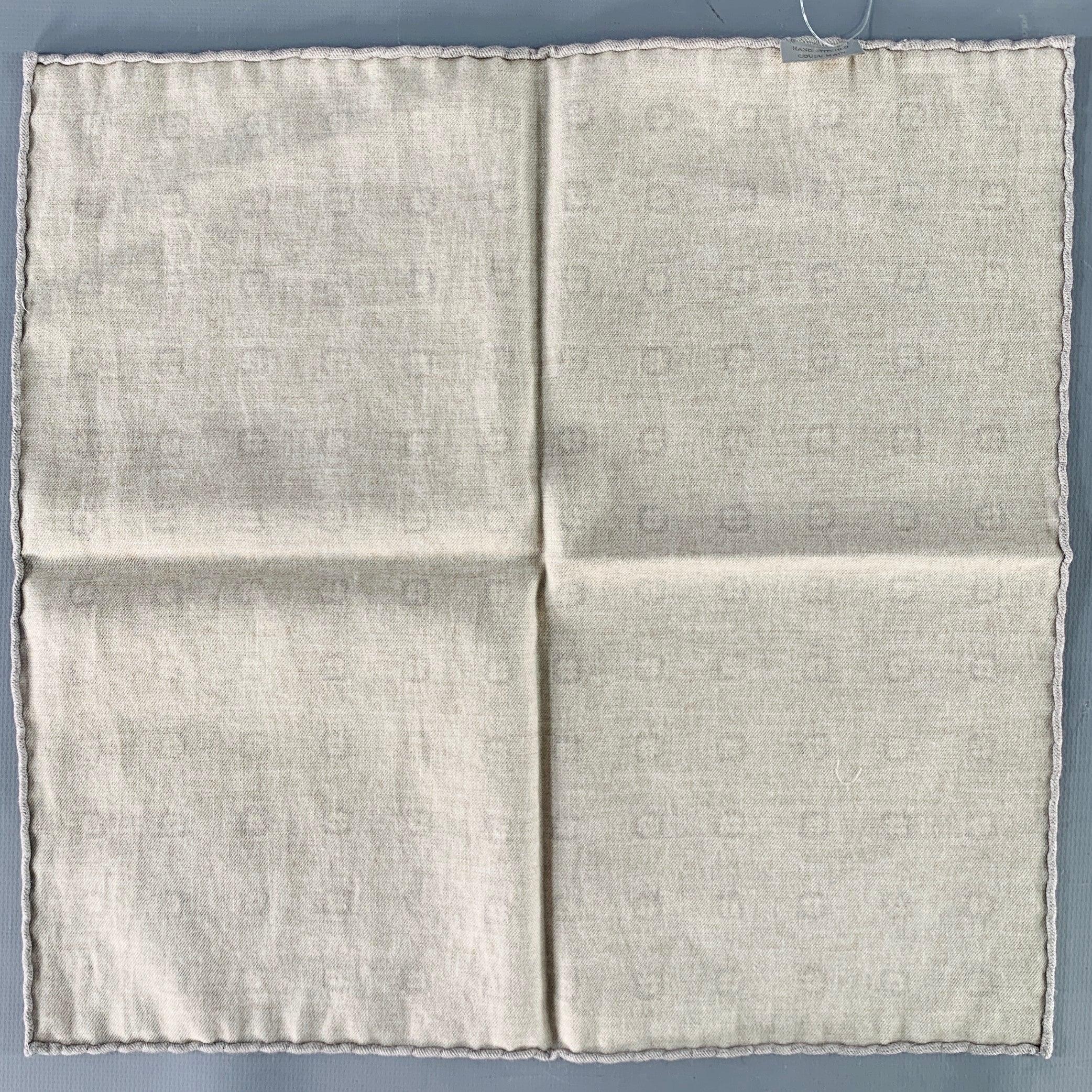 BRUNELLO CUCINELLI pocket square
in a beige and grey woven fabric featuring an abstract floral pattern, and hand rolled edges.Very Good Pre-Owned Condition. Brand tag removed by previous owner. 

Measurements: 
  12 inches  x 11.75 inches 
  
  

