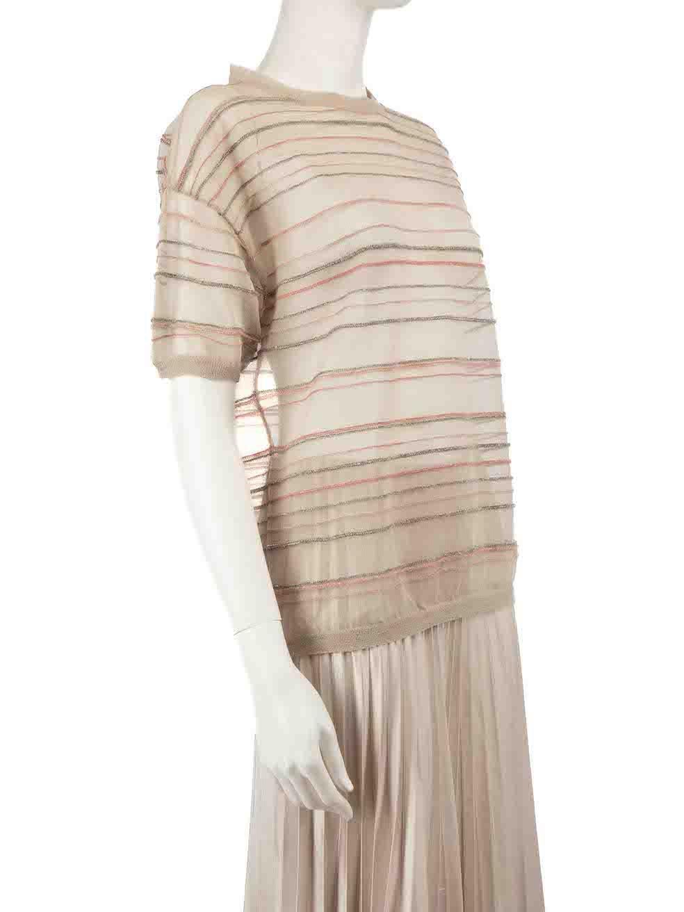 CONDITION is Very good. Minimal wear to top is evident. Composition and size label has been removed on this used Brunello Cucinelli designer resale item.
 
 
 
 Details
 
 
 Beige
 
 Synthetic
 
 Top
 
 Striped metallic pattern
 
 Short sleeves
 
