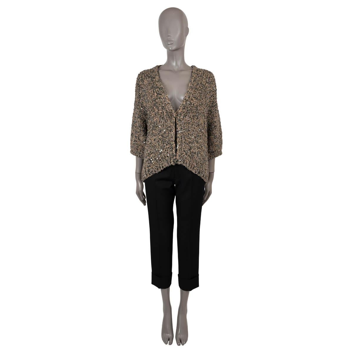 100% authentic Brunello Cucinelli chunky knit oversized cardigan in beige and olive green polyester  (38%), cotton (24%),viscose (20%), polyamide (15%), polyester (3%). Features 3/4 sleeves, dropped shoulders and is embellished with olive green