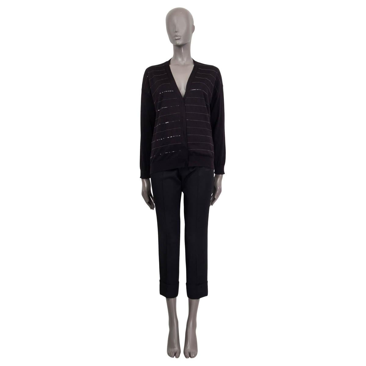 100% authentic Brunello Cucinelli v-neck cardigan in black cashmere (70%) and silk (30%). Features sequin and bead embellished stripes on the front. Closes with five push buttons on the front. Unlined. Has been worn and is in excellent
