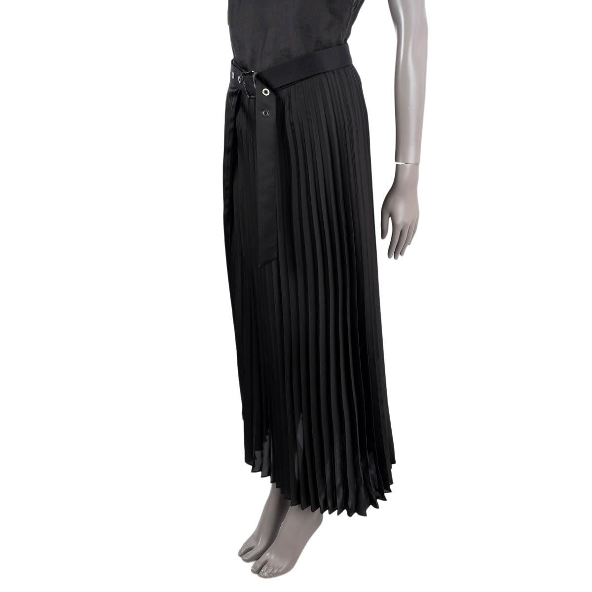 100% authentic Brunello Cucinelli pleated wrap Skirt in black polyester (100%). Features grommet belt at the waistband. Unlined. Has been worn and is in excellent condition.

Measurements
Tag Size	42
Size	M
Waist From	115cm (44.9in)
Hips From	104cm