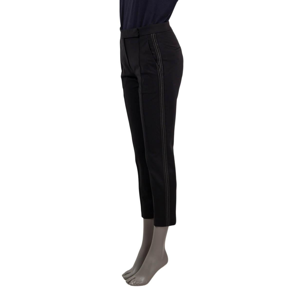 100% authentic Brunello Cucinelli molini cigarette pants in black virgin wool (75%), polyamide (23%) and elastane (2%). Features three molini stripes on the side. Closes with one hooks and a concealed zipper on the front and with slit pockets at the